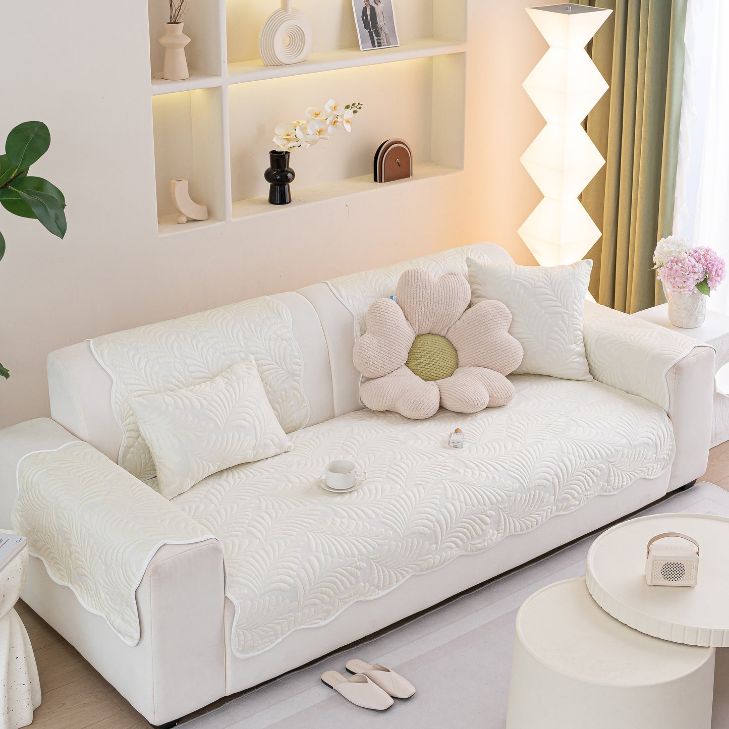 Sofa Cover for Leather & Fabric Couches, 3D Leaf Embossed Quilted Furniture Covers in a modern living room setting.