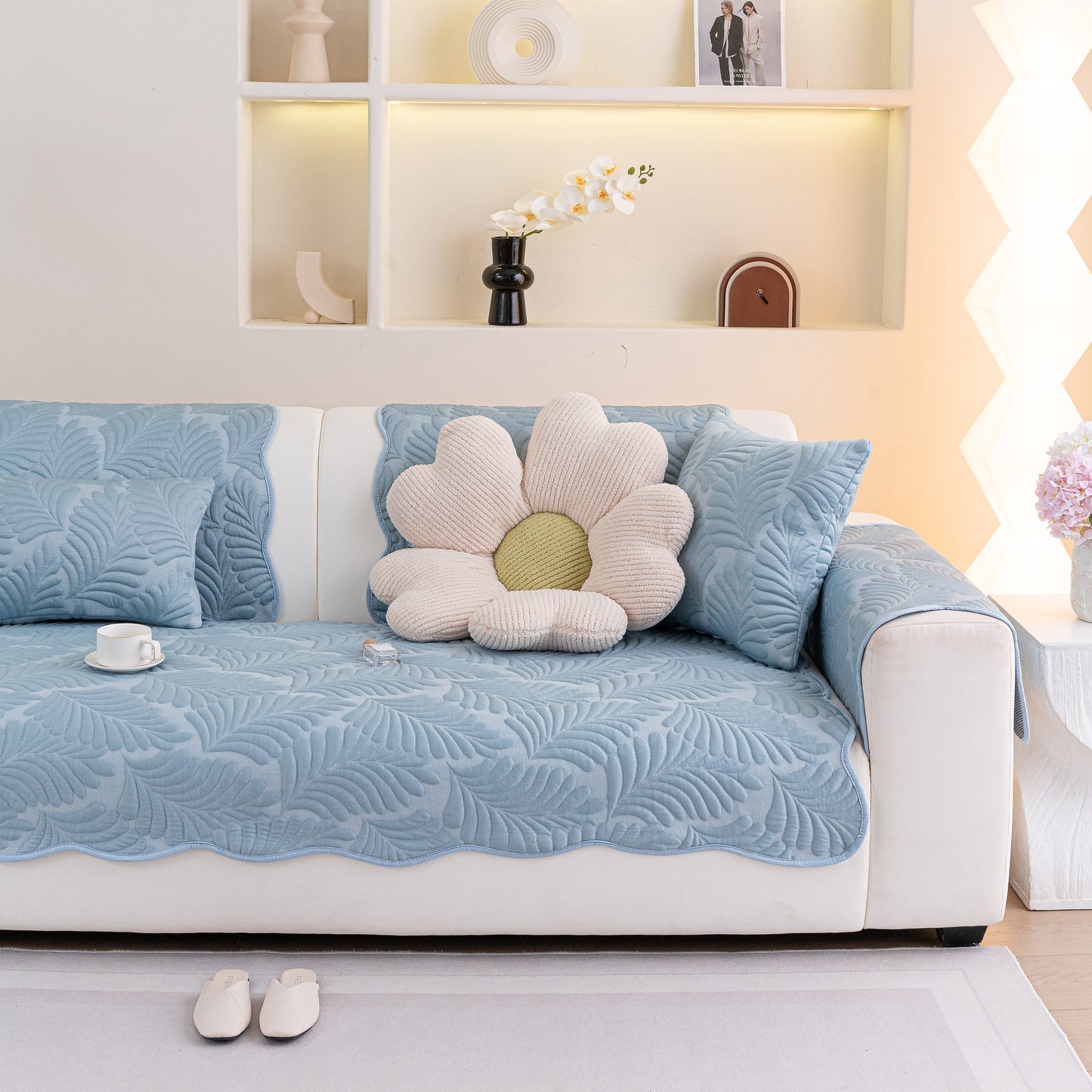 Sofa Cover for Leather & Fabric Couches, 3D Leaf Embossed Quilted Furniture Covers with blue design on white couch.