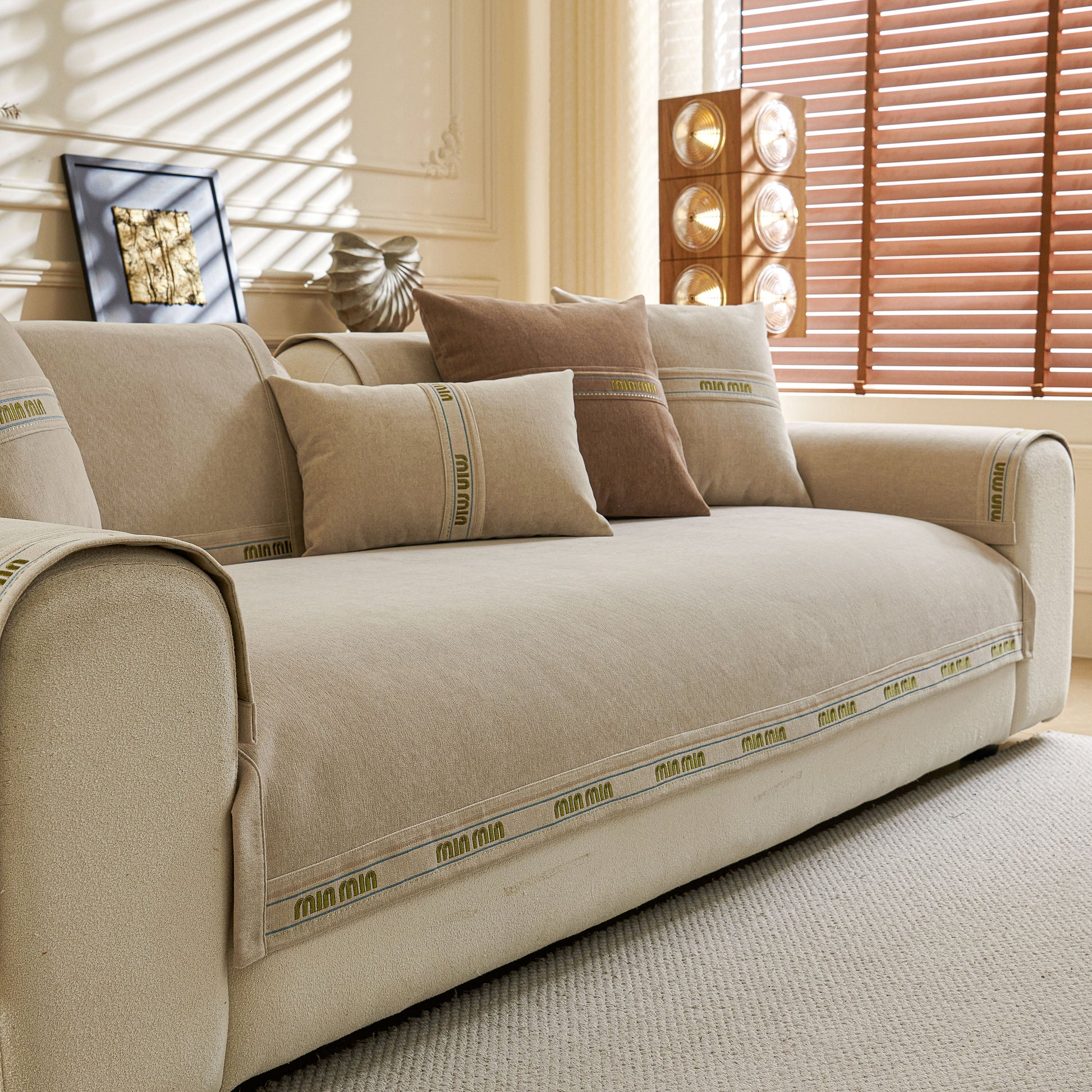 Chenille Sofa Cover Pet Mat, Non-Slip Couch Protector for Sectional & L-Shaped Sofas in textured neutral design on modern sofa