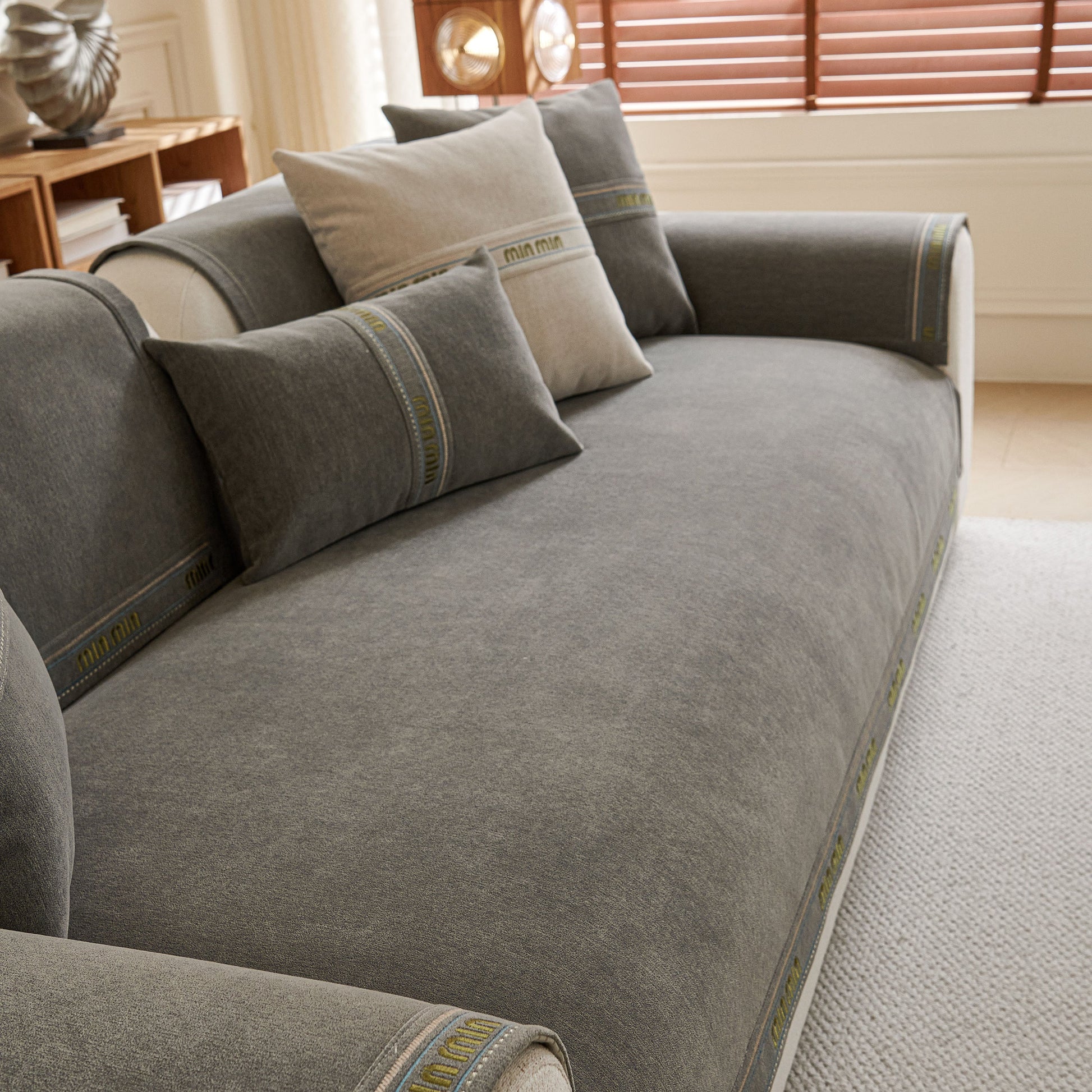 Chenille Sofa Cover Pet Mat, Non-Slip Couch Protector for Sectional & L-Shaped Sofas in a stylish living room setting.