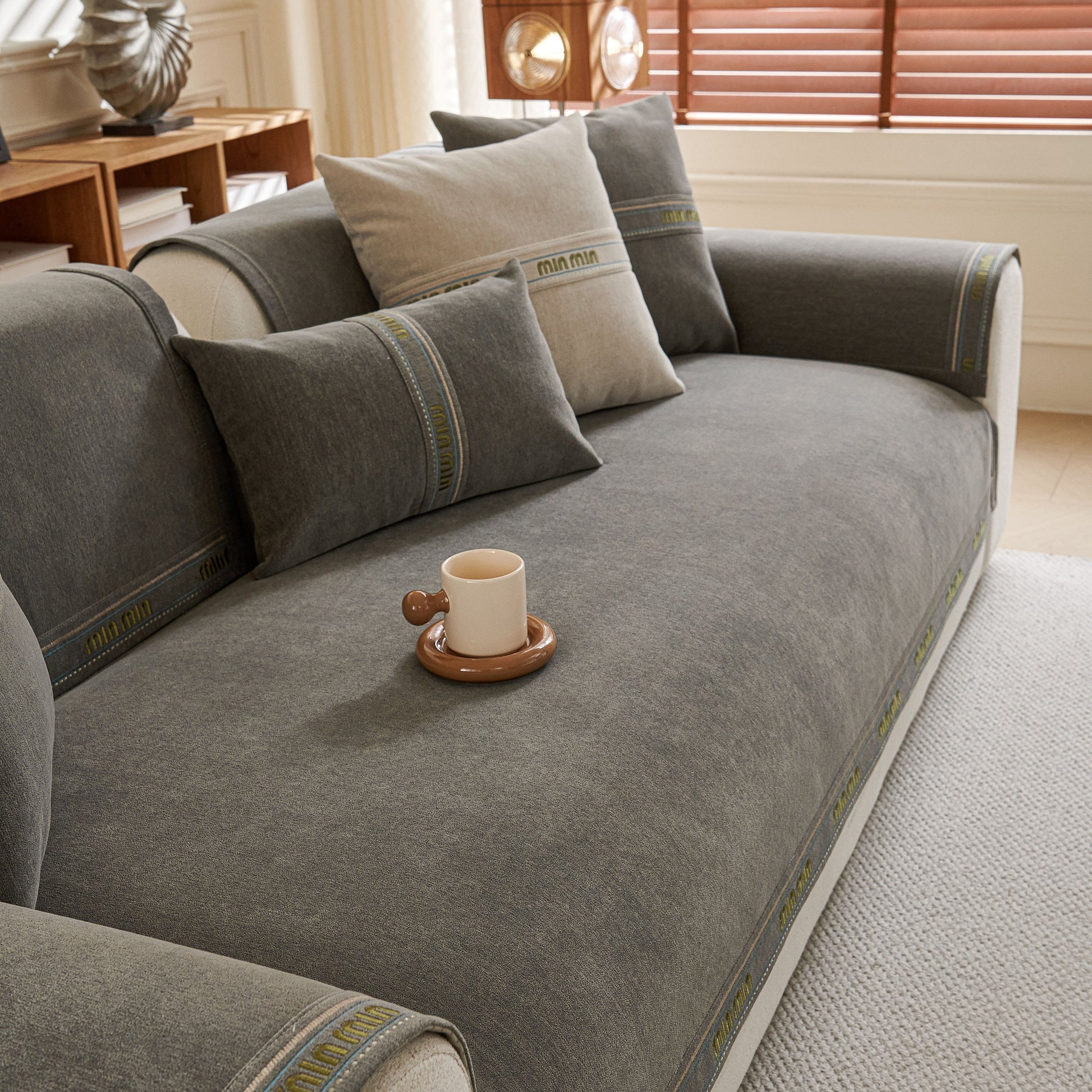 Chenille Sofa Cover Pet Mat, Non-Slip Couch Protector for Sectional & L-Shaped Sofas in a living room setting with cushions and decor.
