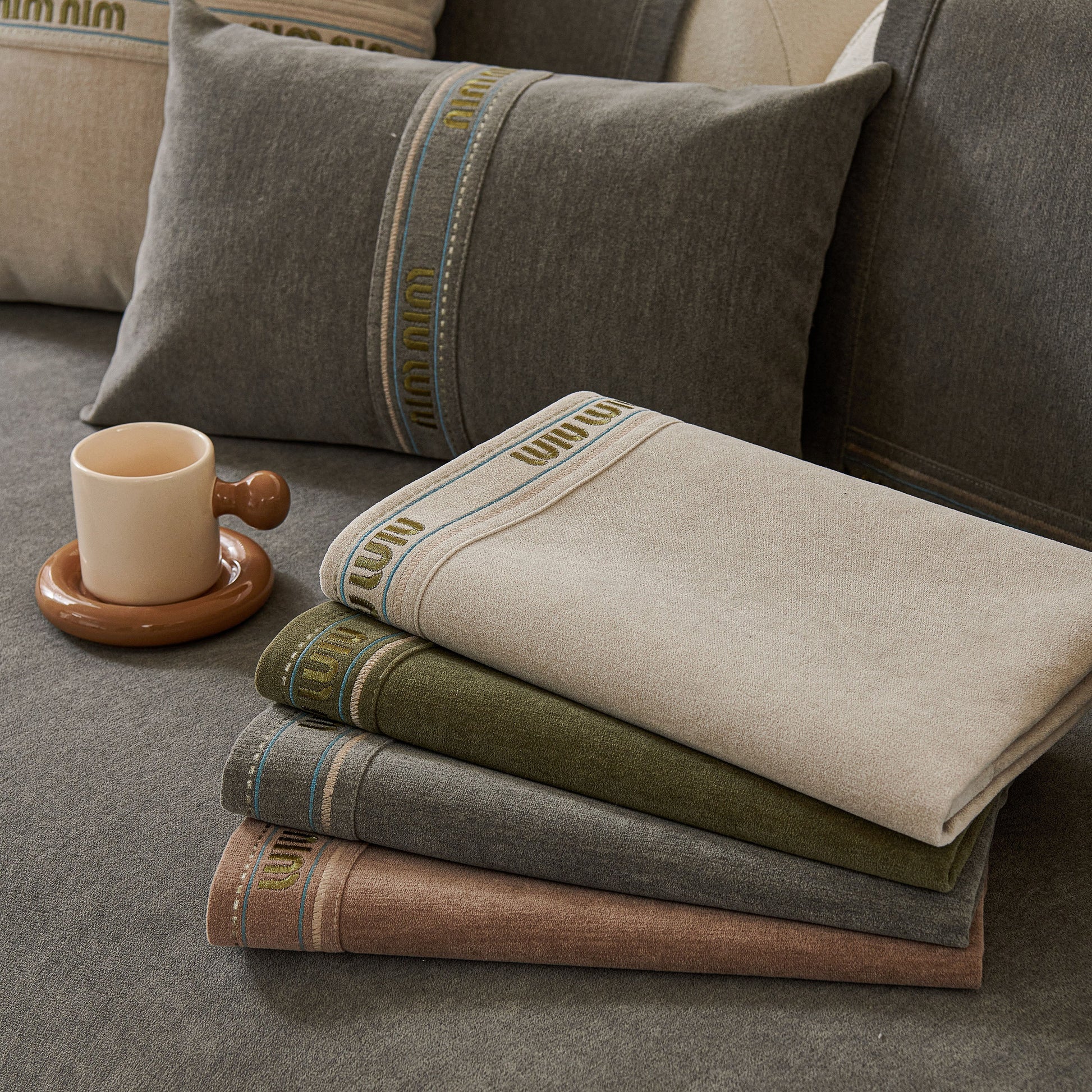 Chenille Sofa Cover Pet Mat, Non-Slip Couch Protector for Sectional & L-Shaped Sofas in neutral tones on a textured sofa.