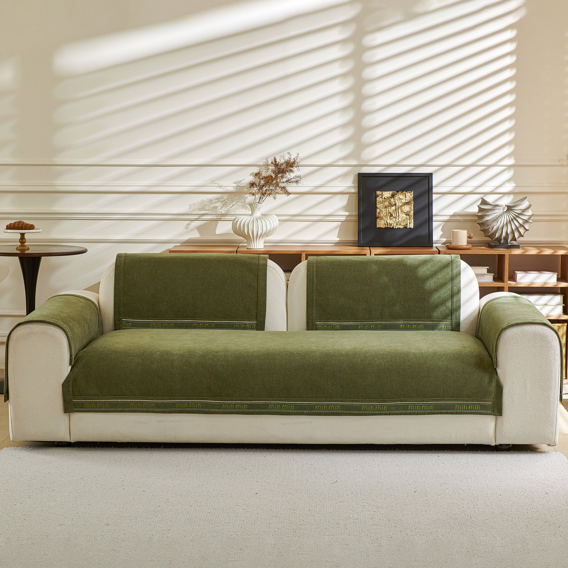 Chenille Sofa Cover Pet Mat, Non-Slip Couch Protector for Sectional & L-Shaped Sofas on a sofa in a stylish living room.
