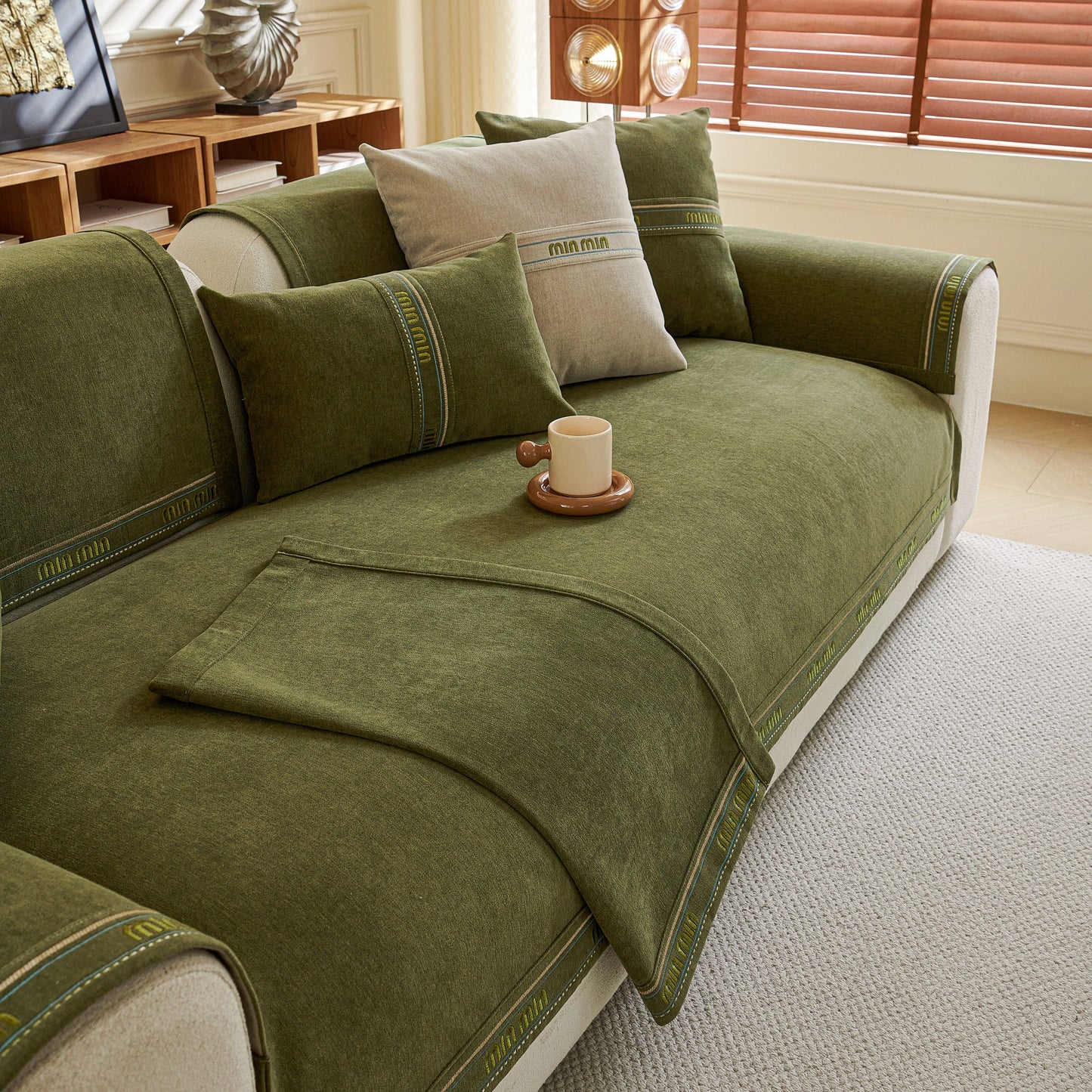 Chenille Sofa Cover Pet Mat, Non-Slip Couch Protector for Sectional & L-Shaped Sofas in green with textured design.