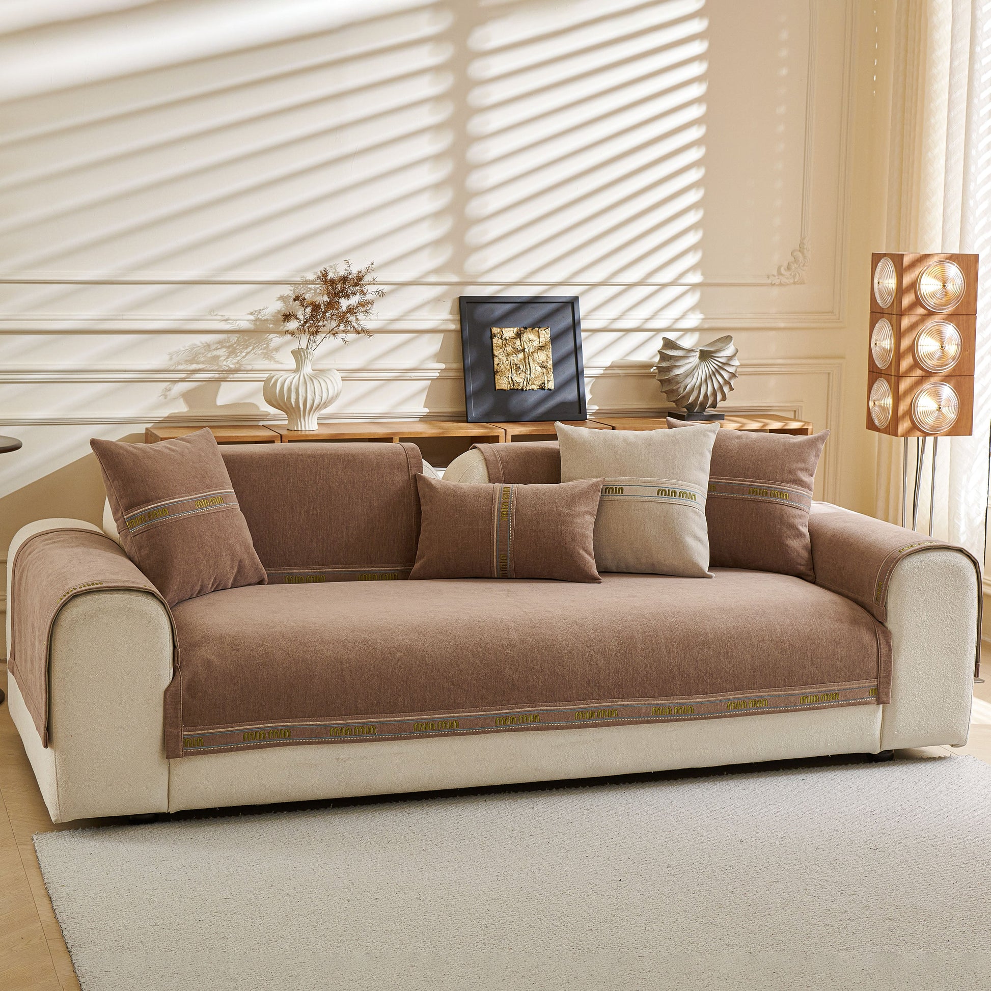 Chenille Sofa Cover Pet Mat, Non-Slip Couch Protector for Sectional & L-Shaped Sofas in stylish neutral tones on a cozy sofa