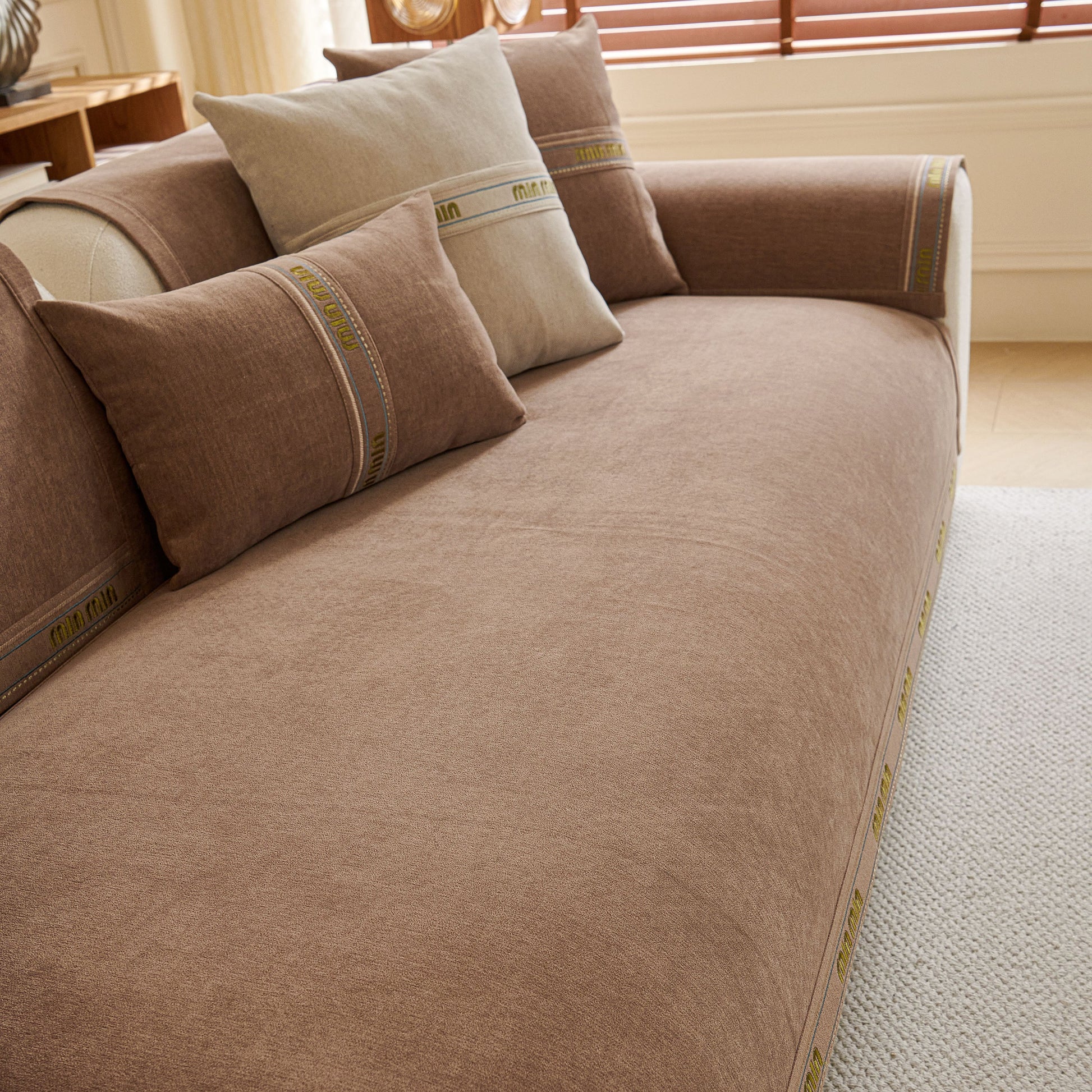 Chenille Sofa Cover Pet Mat, Non-Slip Couch Protector for Sectional & L-Shaped Sofas in a cozy living room setting.