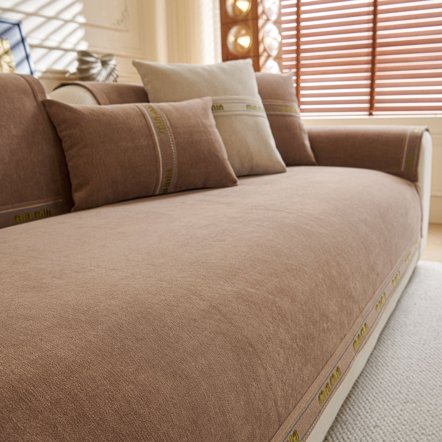 Chenille Sofa Cover Pet Mat, Non-Slip Couch Protector for Sectional & L-Shaped Sofas in neutral tones on a sofa.