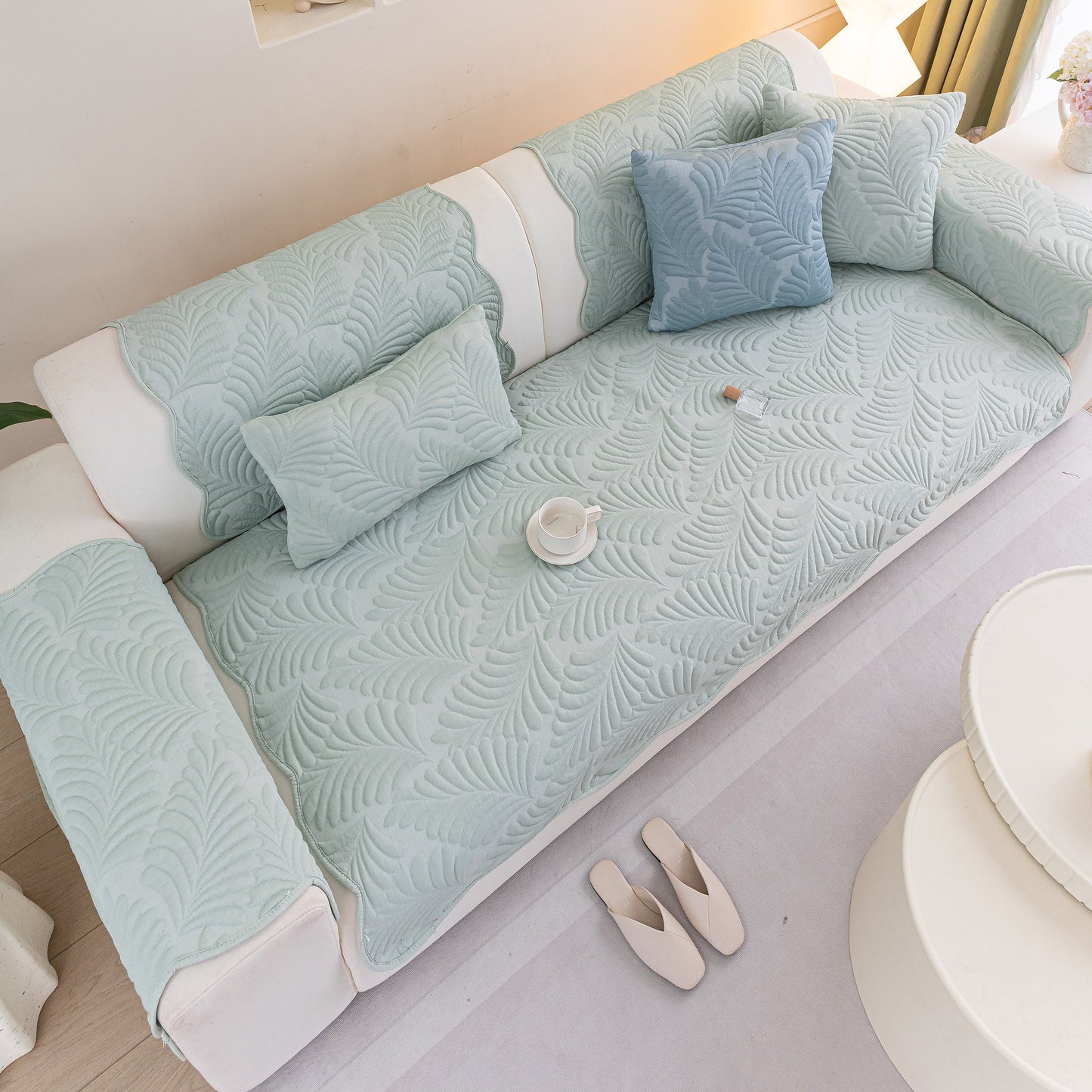 Sofa Cover for Leather & Fabric Couches, 3D Leaf Embossed Quilted Furniture Covers on a sofa