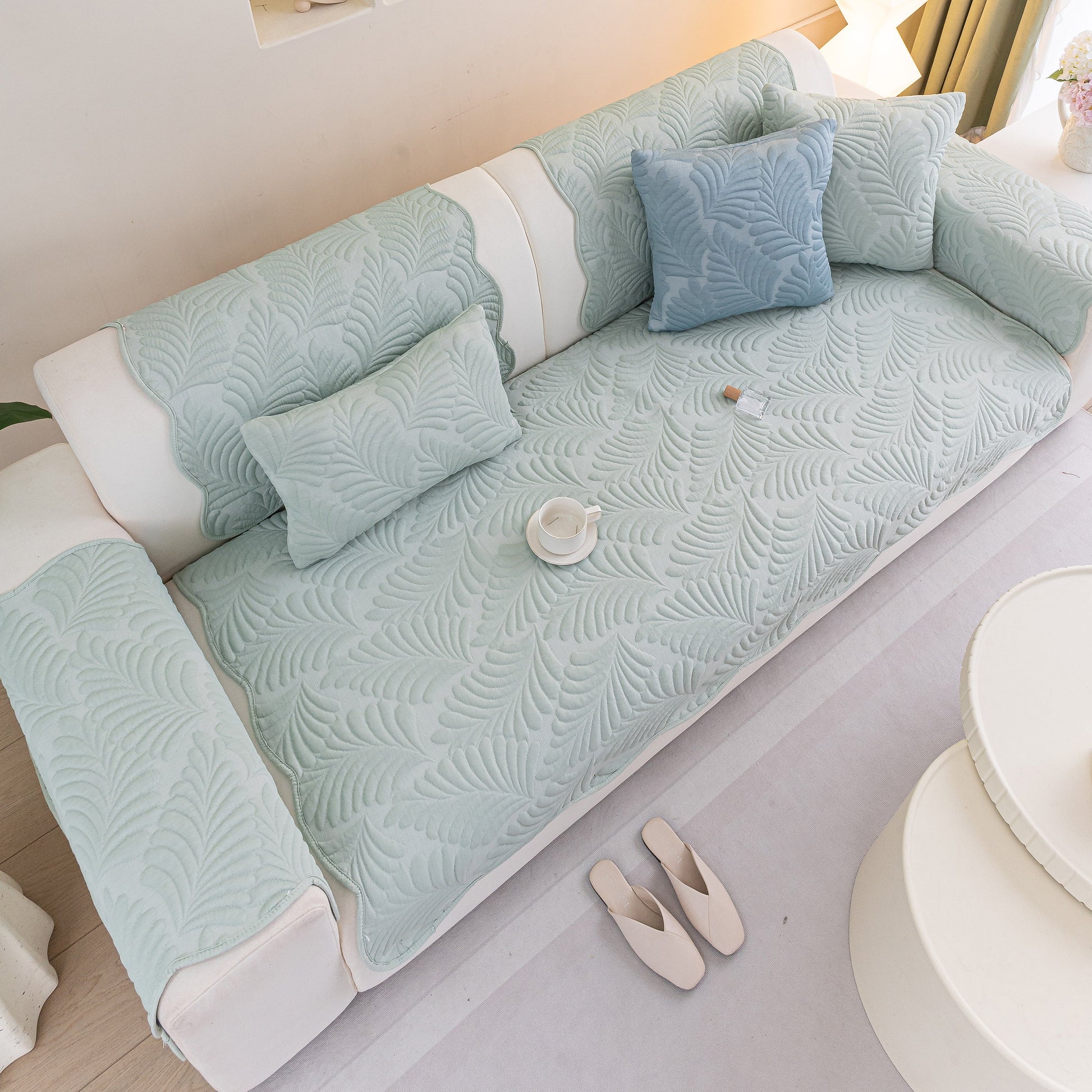 Sofa Cover for Leather & Fabric Couches, 3D Leaf Embossed Quilted Furniture Covers on a sofa