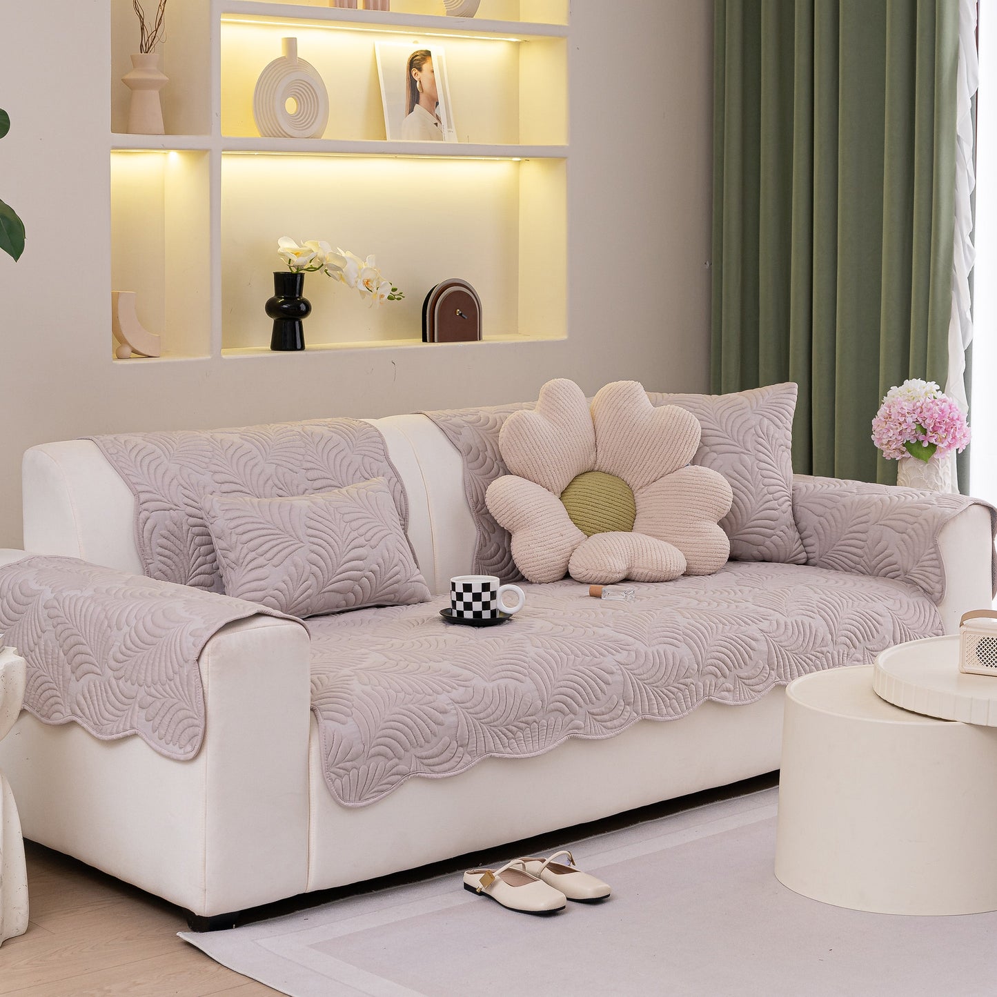 Sofa Cover for Leather & Fabric Couches, 3D Leaf Embossed Quilted Furniture Covers on white sofa with flower pillow