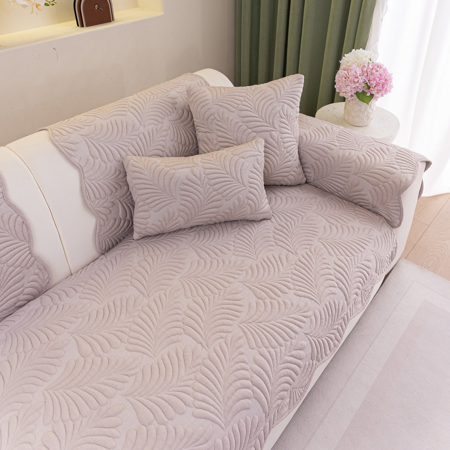 Sofa Cover for Leather & Fabric Couches, 3D Leaf Embossed Quilted Furniture Covers on a couch with decorative pillows