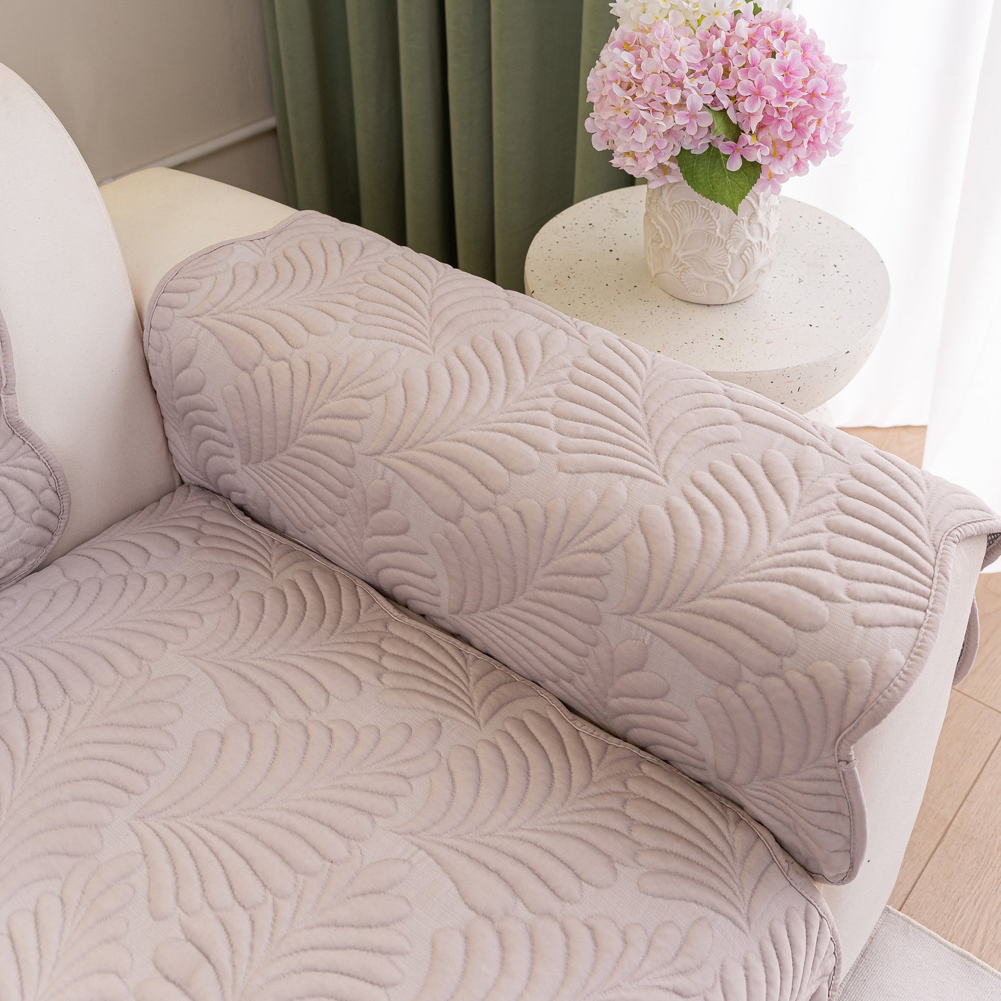 Sofa Cover for Leather & Fabric Couches, 3D Leaf Embossed Quilted Furniture Covers with anti-slip backing and wave-cut design.