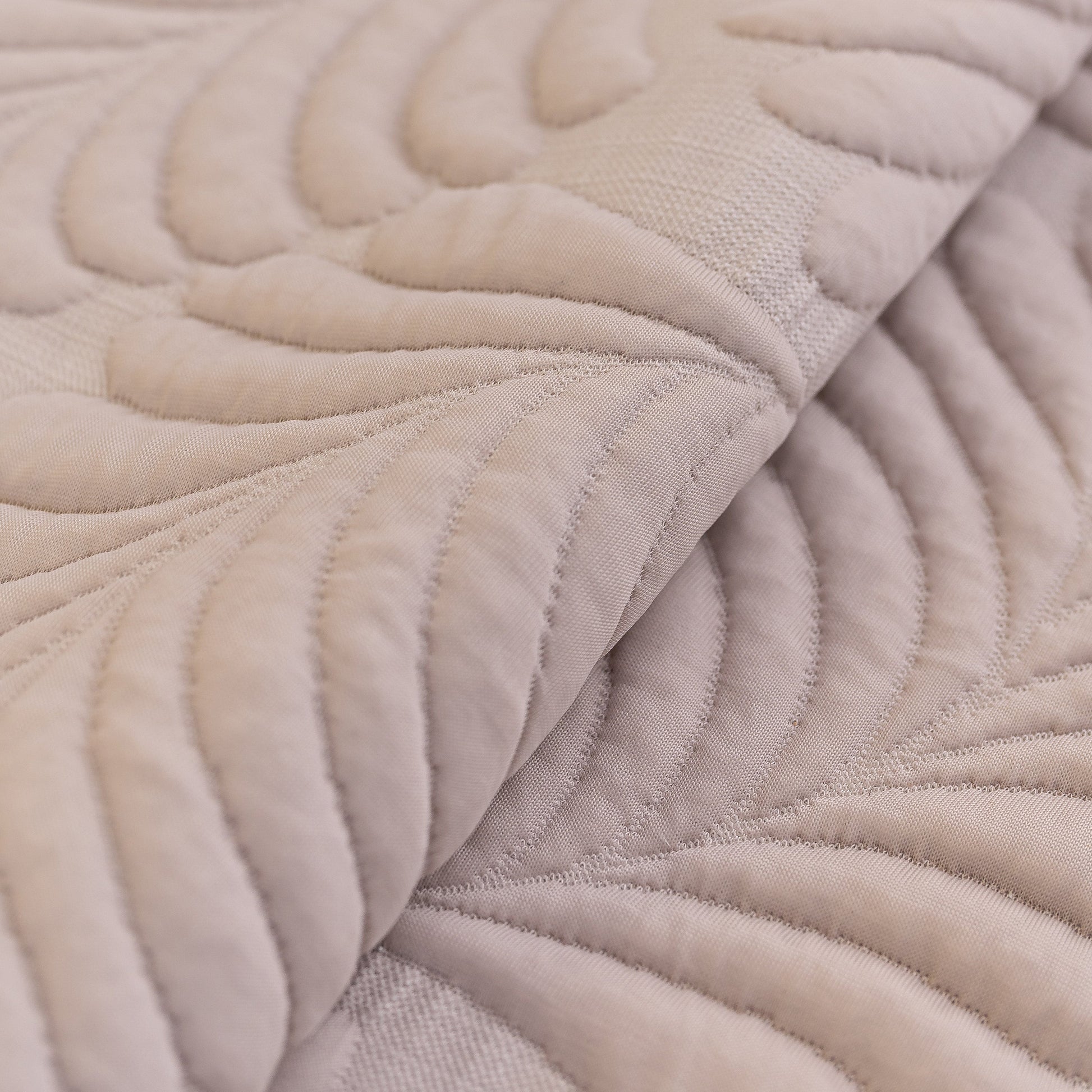 Sofa Cover for Leather & Fabric Couches, 3D Leaf Embossed Quilted Furniture Covers with wave-cut edges and anti-slip backing.