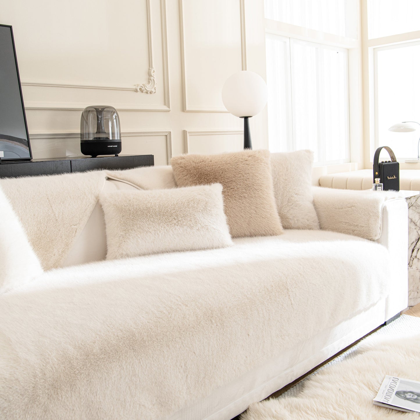 Faux Mink Velvet Luxury Fluffy Sofa Cushion, Winter Warm Thick Plush Non-slip Sofa Covers on a stylish sofa in a bright living room.