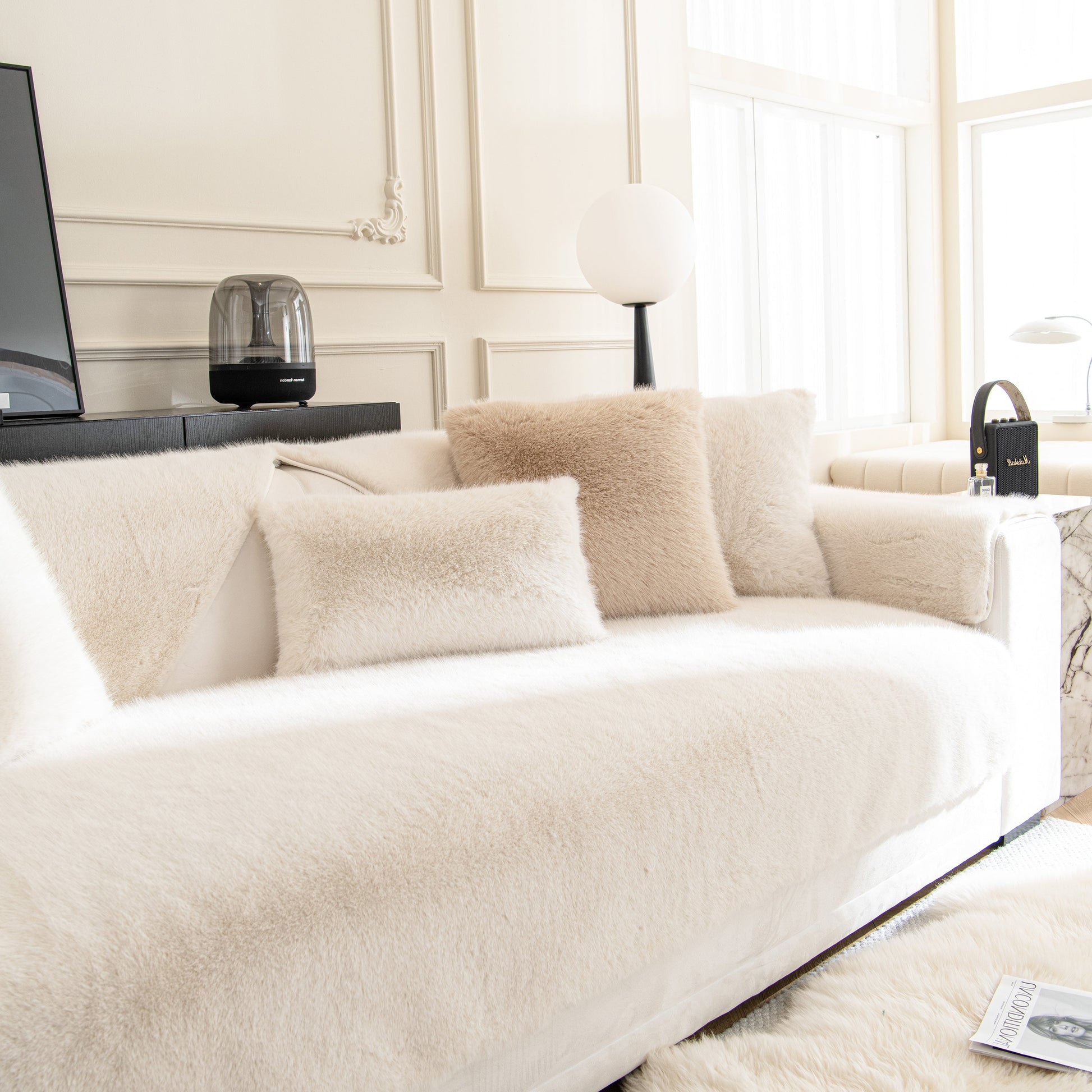 Faux Mink Velvet Luxury Fluffy Sofa Cushion, Winter Warm Thick Plush Non-slip Sofa Covers on a stylish sofa in a bright living room.
