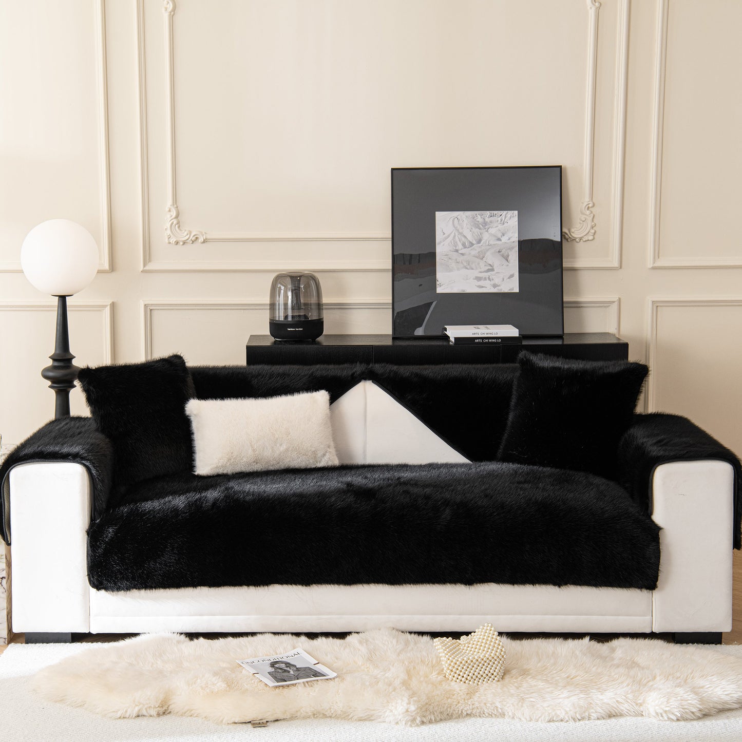 Faux Mink Velvet Luxury Fluffy Sofa Cushion, Winter Warm Thick Plush Non-slip Sofa Covers on a stylish black couch.