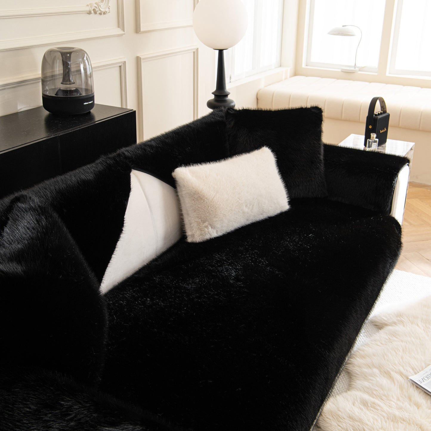 Faux Mink Velvet Luxury Fluffy Sofa Cushion, Winter Warm Thick Plush Non-slip Sofa Covers on a black plush sofa.