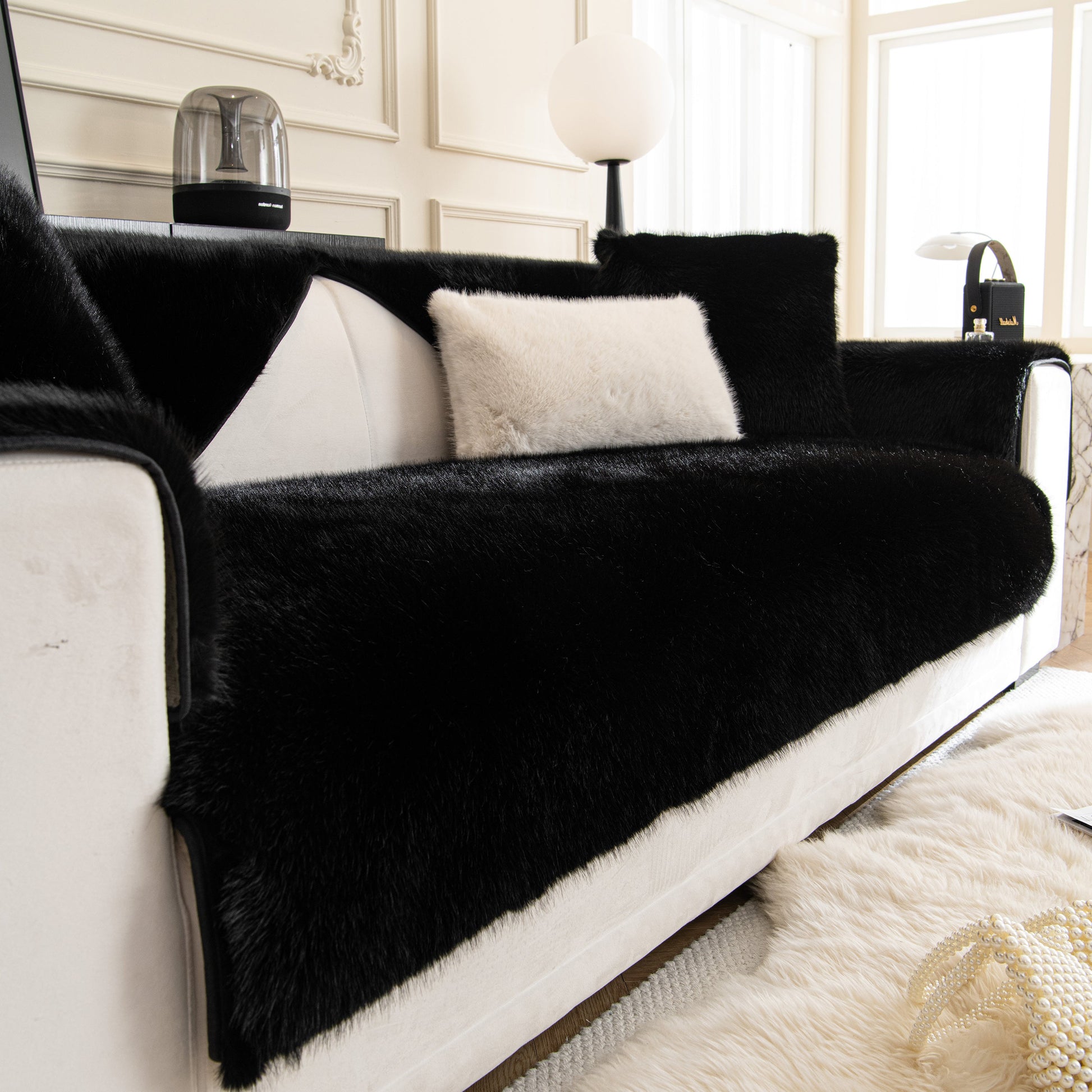 Faux Mink Velvet Luxury Fluffy Sofa Cushion, Winter Warm Thick Plush Non-slip Sofa Covers in black displayed on a white sofa