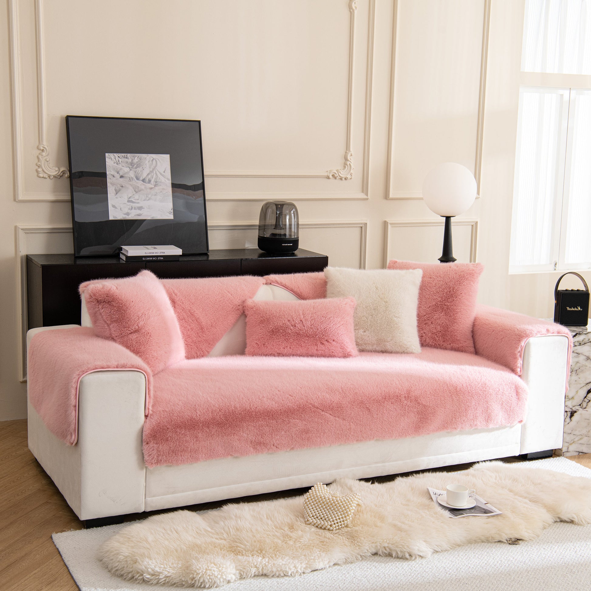 Faux Mink Velvet Luxury Fluffy Sofa Cushion, Winter Warm Thick Plush Non-slip Sofa Covers enhancing a pink and white sofa setup.