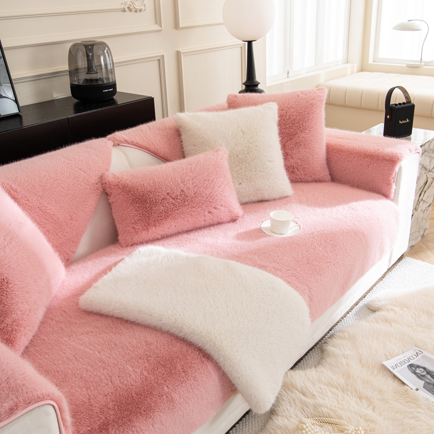 Faux Mink Velvet Luxury Fluffy Sofa Cushion, Winter Warm Thick Plush Non-slip Sofa Covers in pink and white on a sofa.