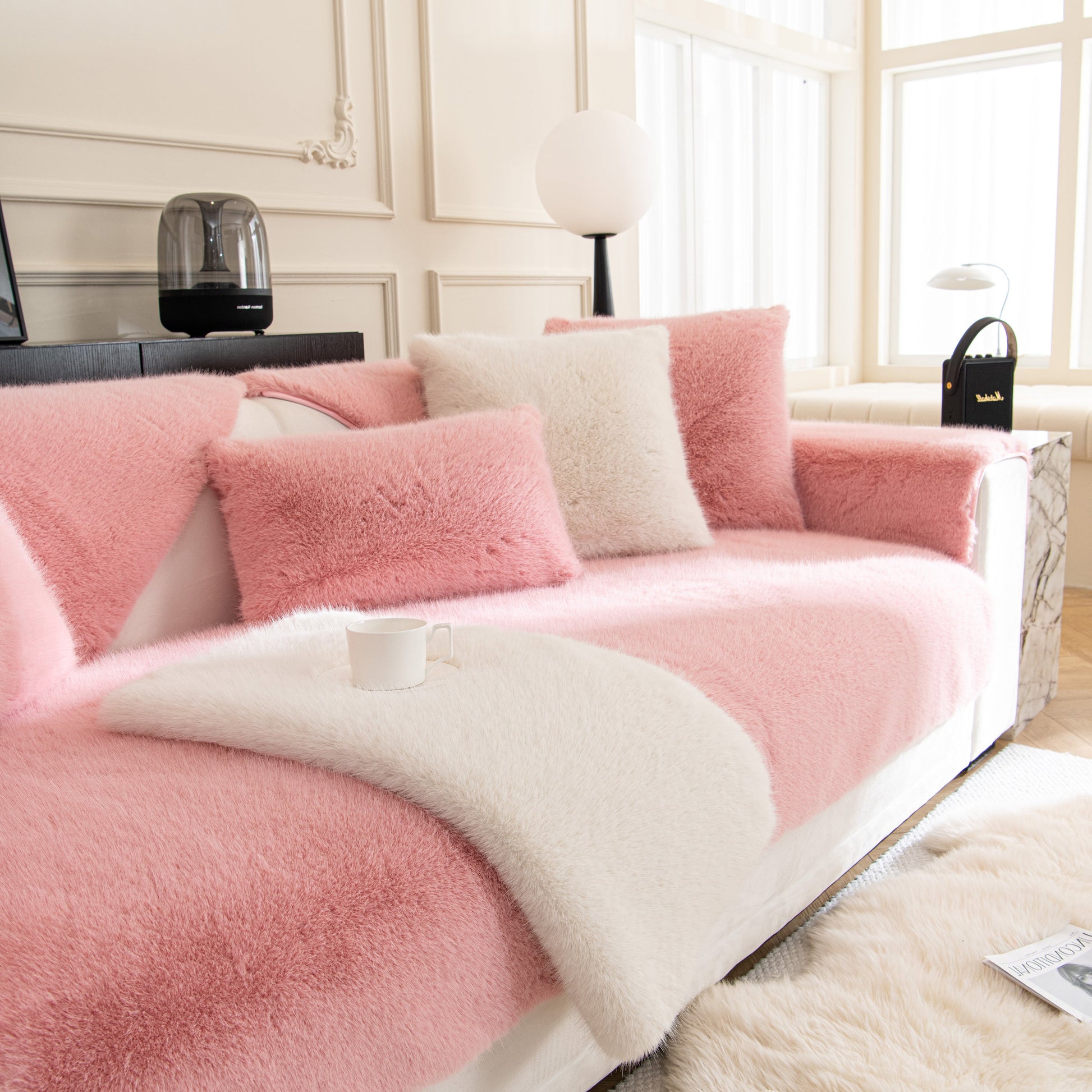 Faux Mink Velvet Luxury Fluffy Sofa Cushion, Winter Warm Thick Plush Non-slip Sofa Covers in pink on a modern sofa.