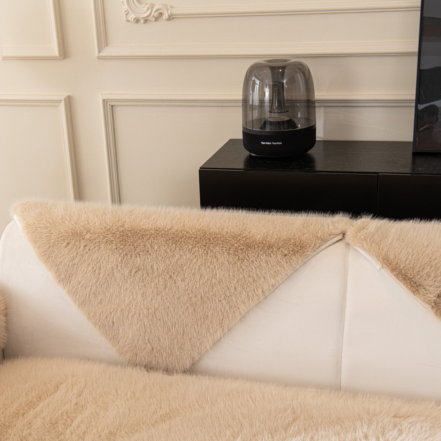 Faux Mink Velvet Luxury Fluffy Sofa Cushion, Winter Warm Thick Plush Non-slip Sofa Covers on a cream sofa in an elegant living room.