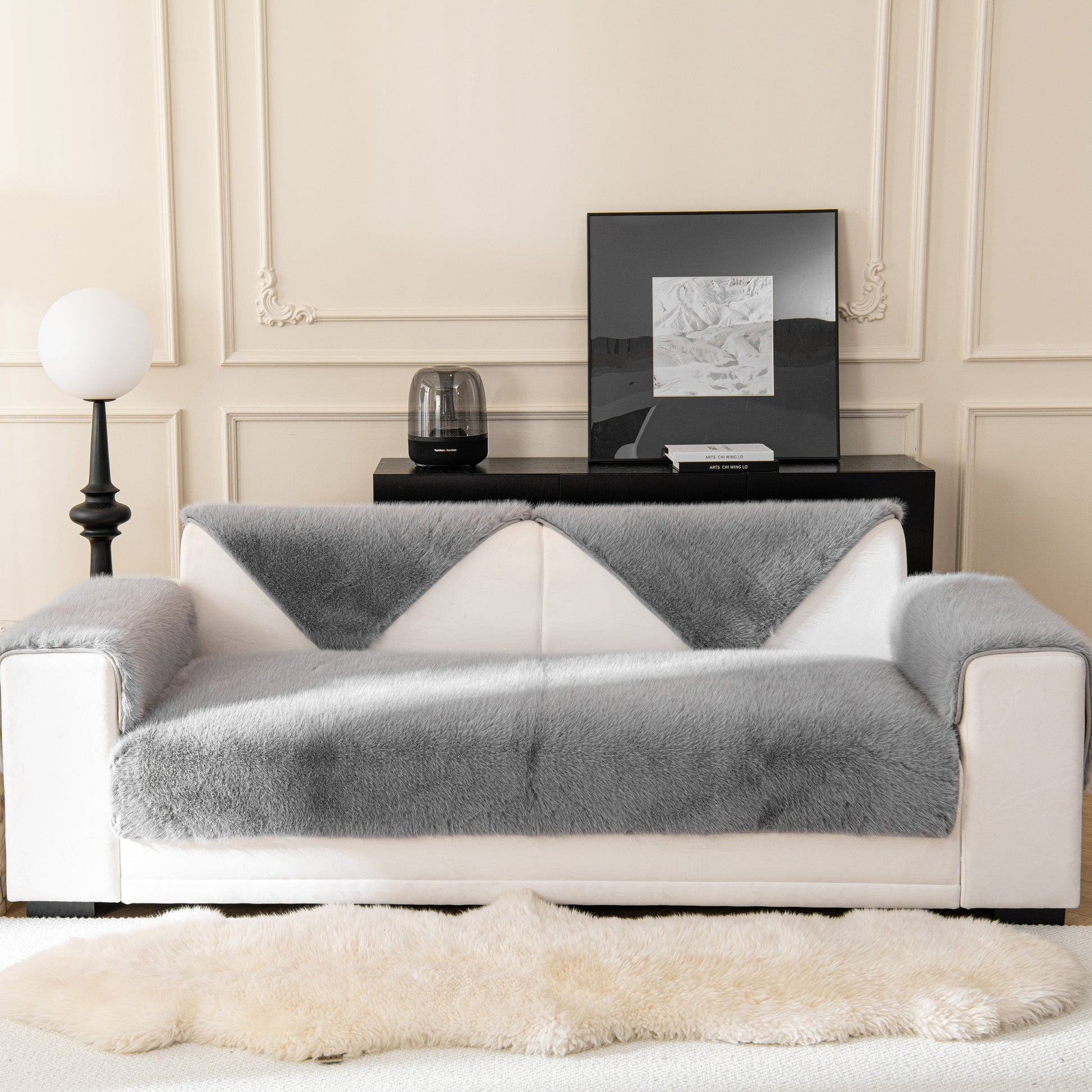 Luxurious grey Faux Mink Velvet Luxury Fluffy Sofa Cushion on a white sofa, featuring winter warm thick plush non-slip sofa covers.