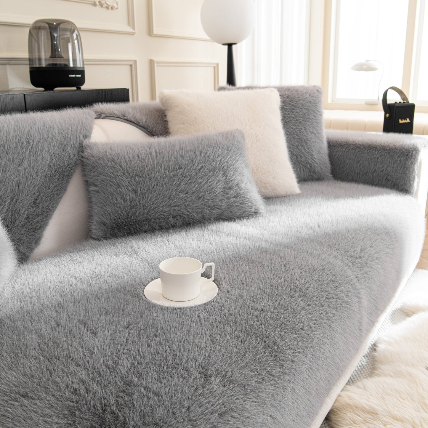 Faux Mink Velvet Luxury Fluffy Sofa Cushion, Winter Warm Thick Plush Non-slip Sofa Covers in grey on a stylish couch.