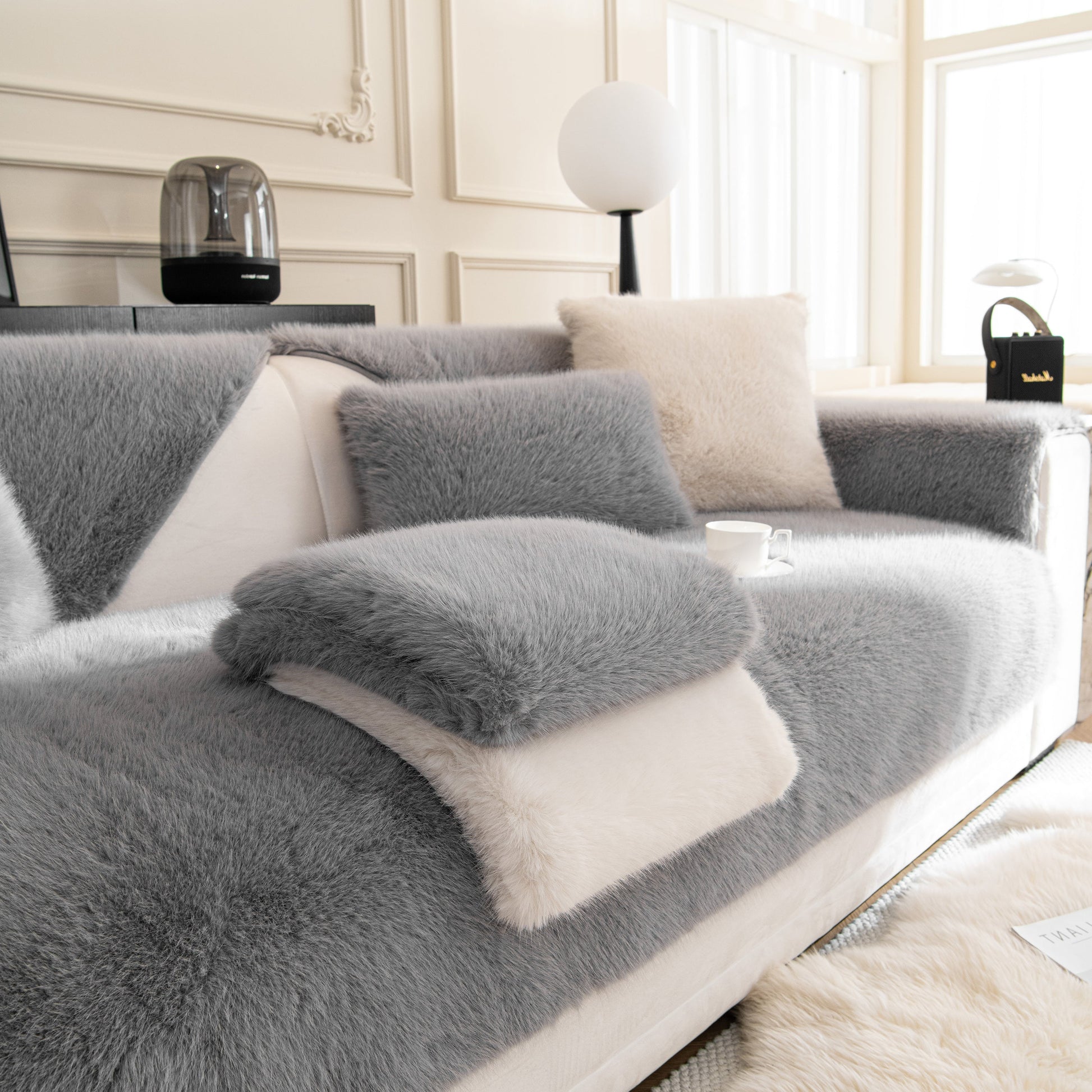 Faux Mink Velvet Luxury Fluffy Sofa Cushion, Winter Warm Thick Plush Non-slip Sofa Covers on a modern living room sofa.