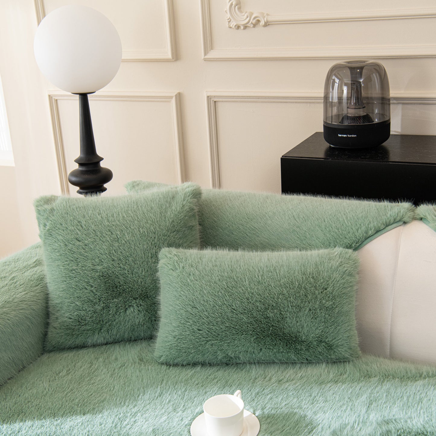Faux Mink Velvet Luxury Fluffy Sofa Cushion, Winter Warm Thick Plush Non-slip Sofa Covers in green on a sofa.