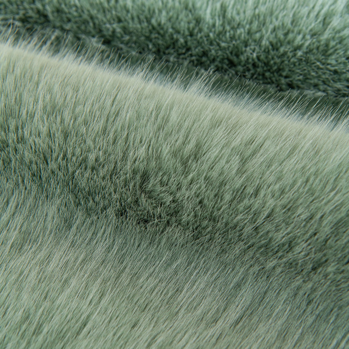 Close-up of Faux Mink Velvet Luxury Fluffy Sofa Cushion showing plush winter warm thick pile and texture.