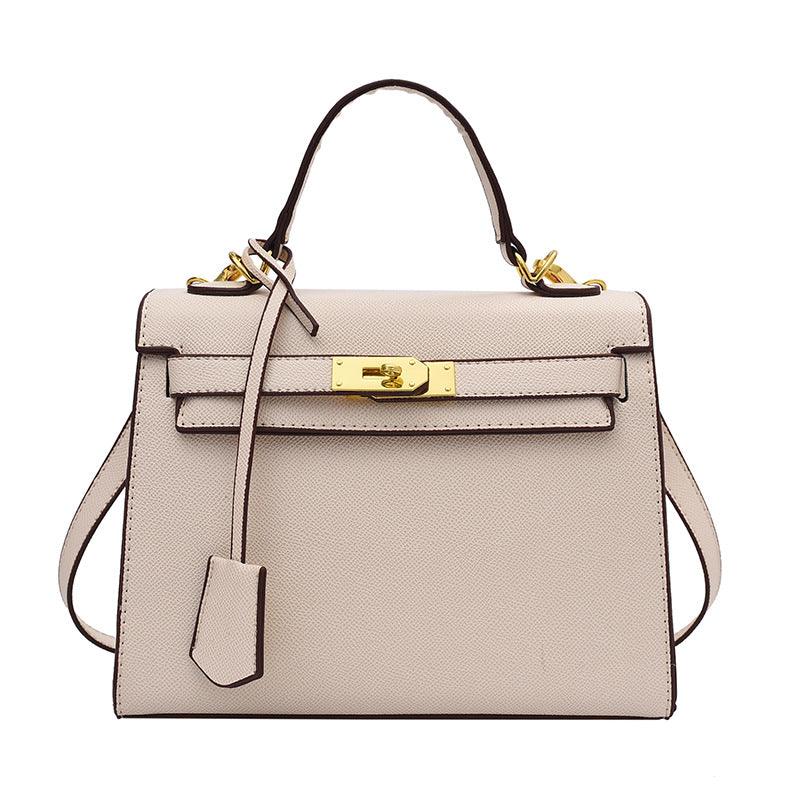 Luxury Cowgirl Kelly Purse – Trendy, High-Fashion Leather Handbag with Adjustable Strap featuring buckle lock design