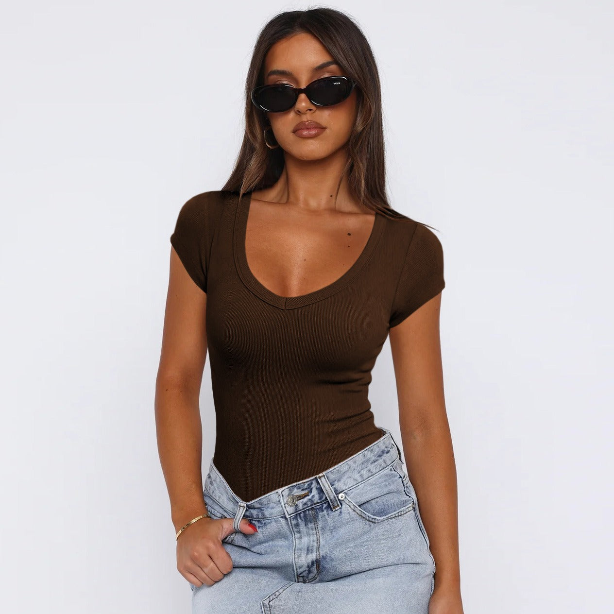 Model wearing Saddle Ridge Everyday Tee in Coffee, paired with jeans, showcasing the T-shirt's comfortable and flattering fit for modern cowgirls.