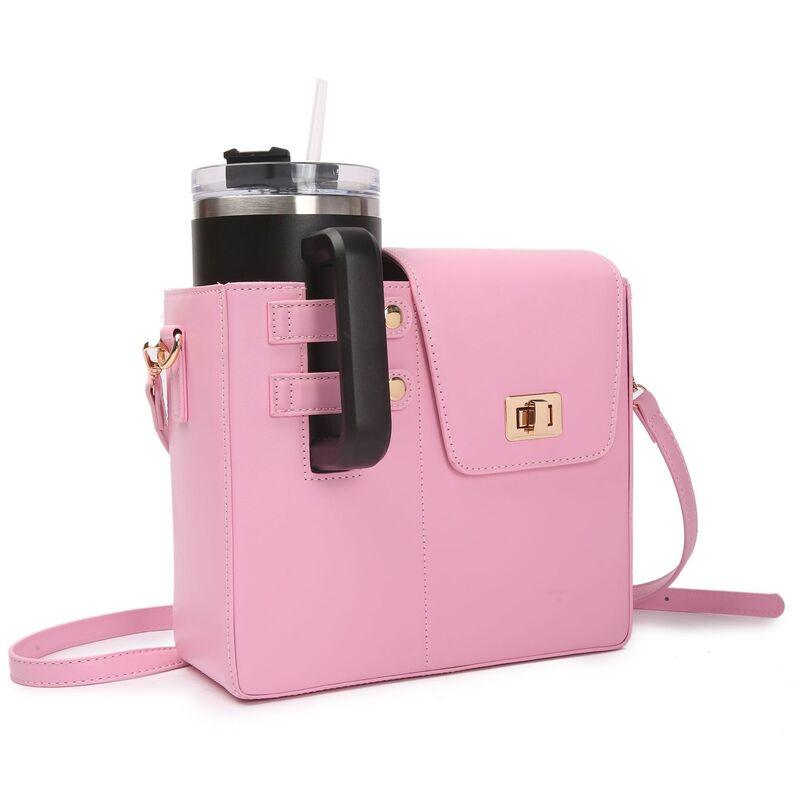 Pink VersaStyle Crossbody Handbag with cup holder, blending fashion and functionality for a chic, versatile accessory.