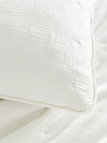 Close-up of Easy Cotton Gauze Quilt & Pillow Set featuring lightweight, breathable 100% cotton fabric in white for hot summer nights.