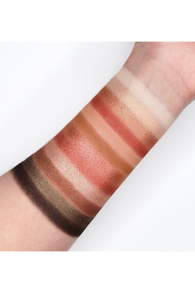 Go2 EGO TRIP - GES02 eyeshadow palette swatches on arm, featuring mattes, shimmers, and glitters for versatile makeup looks