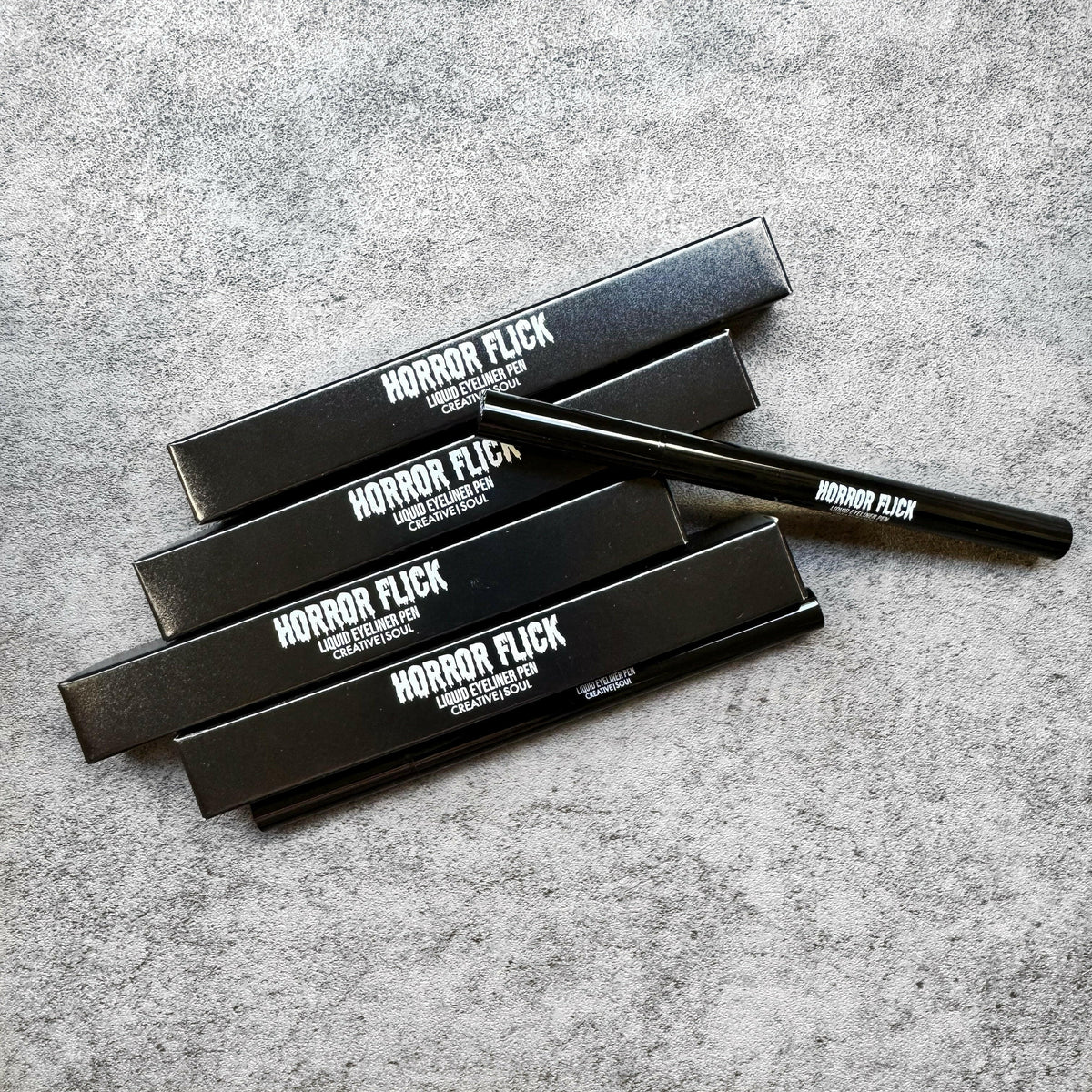 Midnight Horror Flick Liquid Eyeliner Pen with precision tip for easy, long-lasting, waterproof application in ultra black shade.