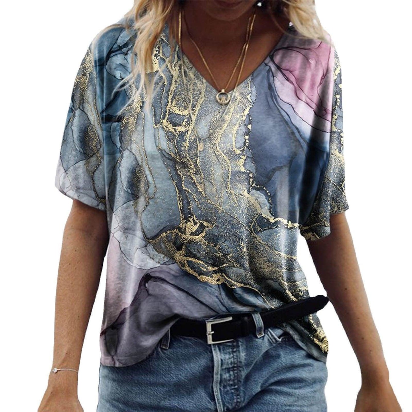 Model wearing Women's Spring Glitzy V-Neck Short Sleeved Marble Print Top with vibrant tie-dye effect and glitzy neckline.