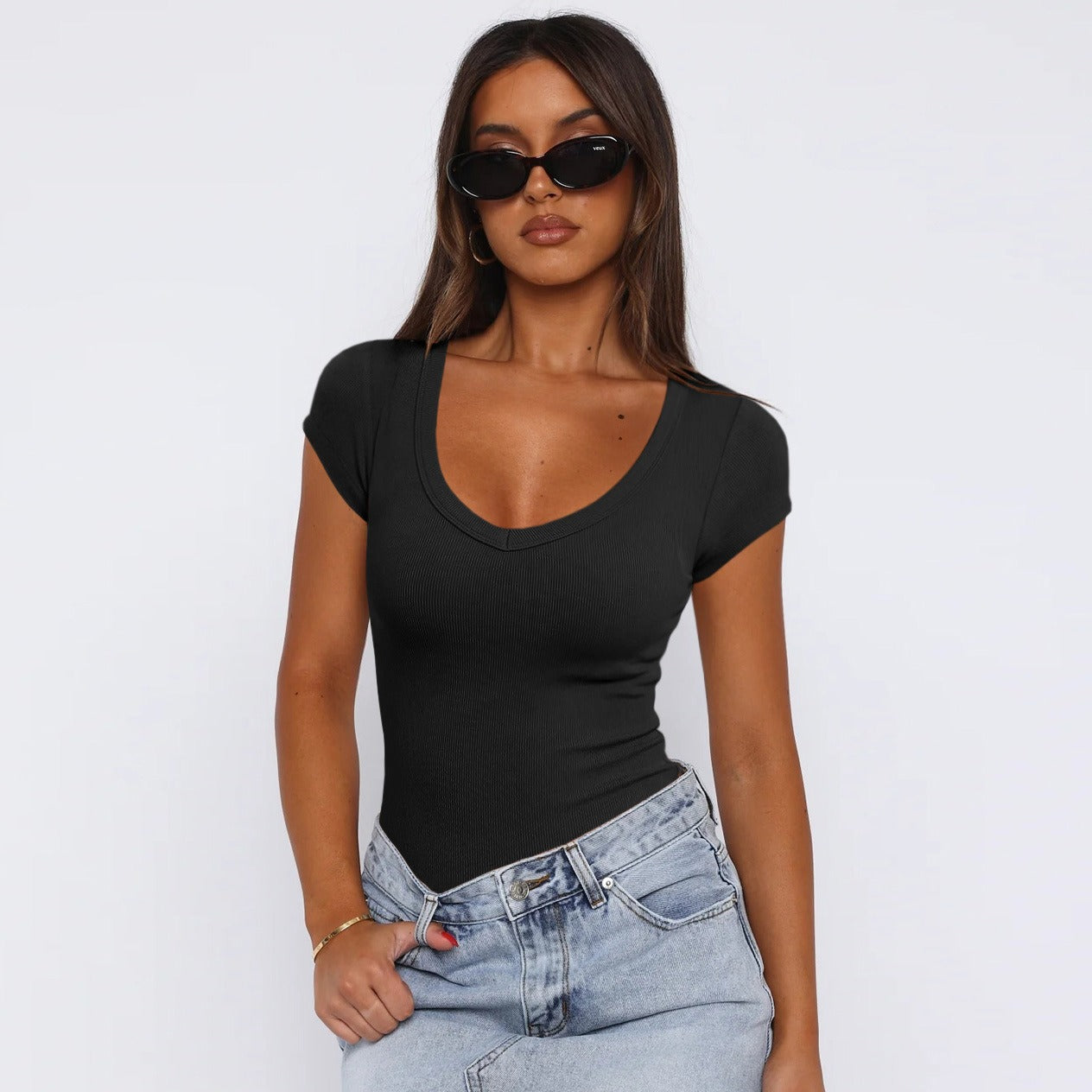 Woman wearing black Saddle Ridge Everyday Tee with jeans