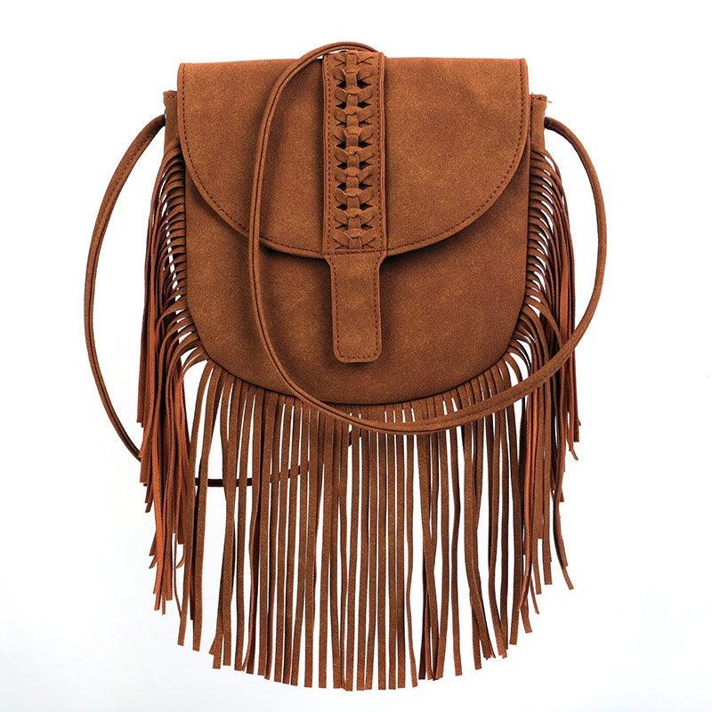 Dakota Tasseled Boho Leather Bag - Trendy Large Tassel Shoulder Bag with intricate weaving and boho-chic tassels in soft simulated leather.