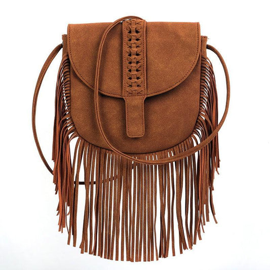 Dakota Tasseled Boho Leather Bag - Trendy Large Tassel Shoulder Bag with intricate weaving and boho-chic tassels in soft simulated leather.