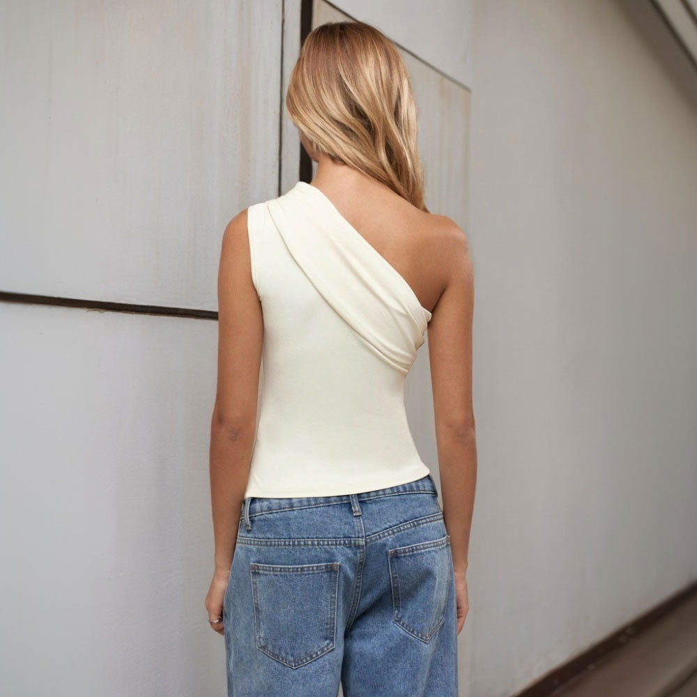 Back view of Sierra Slant Off-Shoulder Top in apricot hue showcasing slanted neckline and slim-fit design
