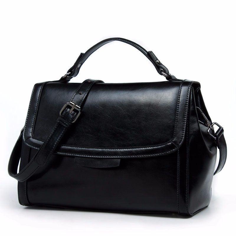 Luxury Genuine Leather Fashion Handbag for Cowgirls - Premium Black & Retro Brown shown in black color.