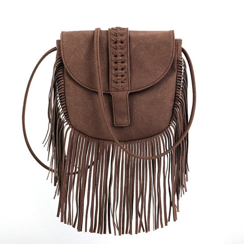 Dakota Tasseled Boho Leather Bag - Trendy Large Tassel Shoulder Bag with intricate weaving and fringed tassels.