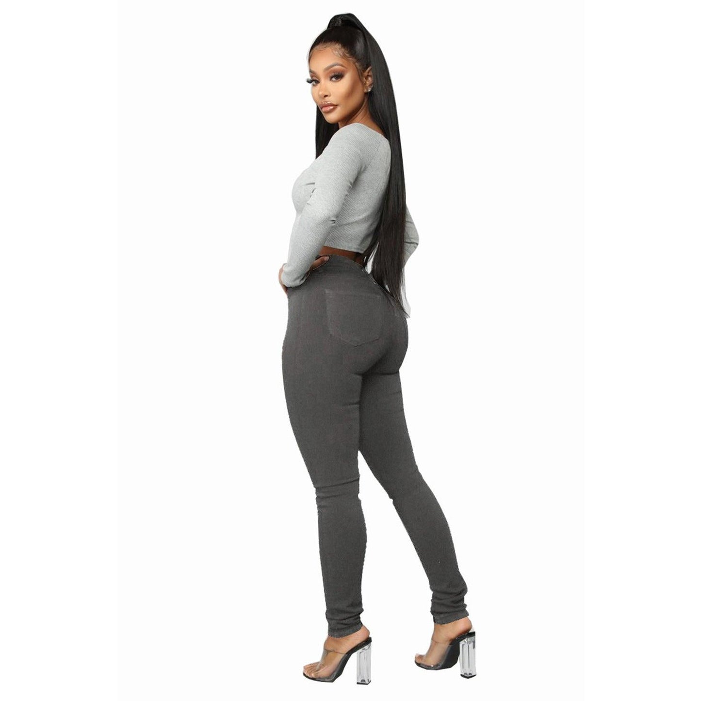 Woman wearing Cowgirl Chic High Waisted Skinny Jeans in Black, showcasing flattering fit and stylish design