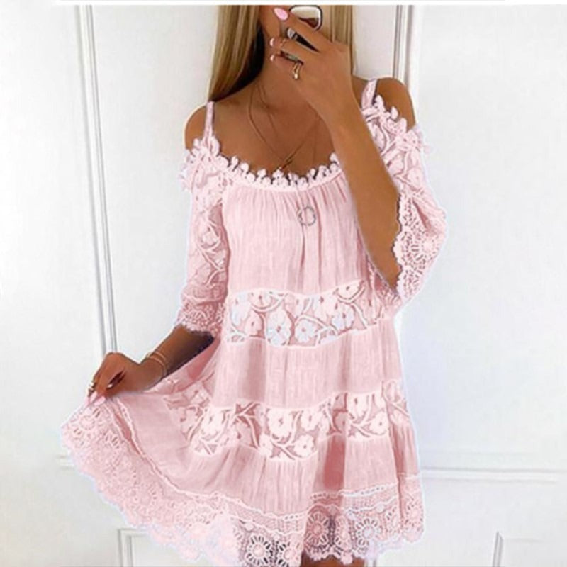 Model wearing Lace Embrace Summer Sling Dress with lace details and flowing sleeves, perfect for sunny days and romantic evenings.