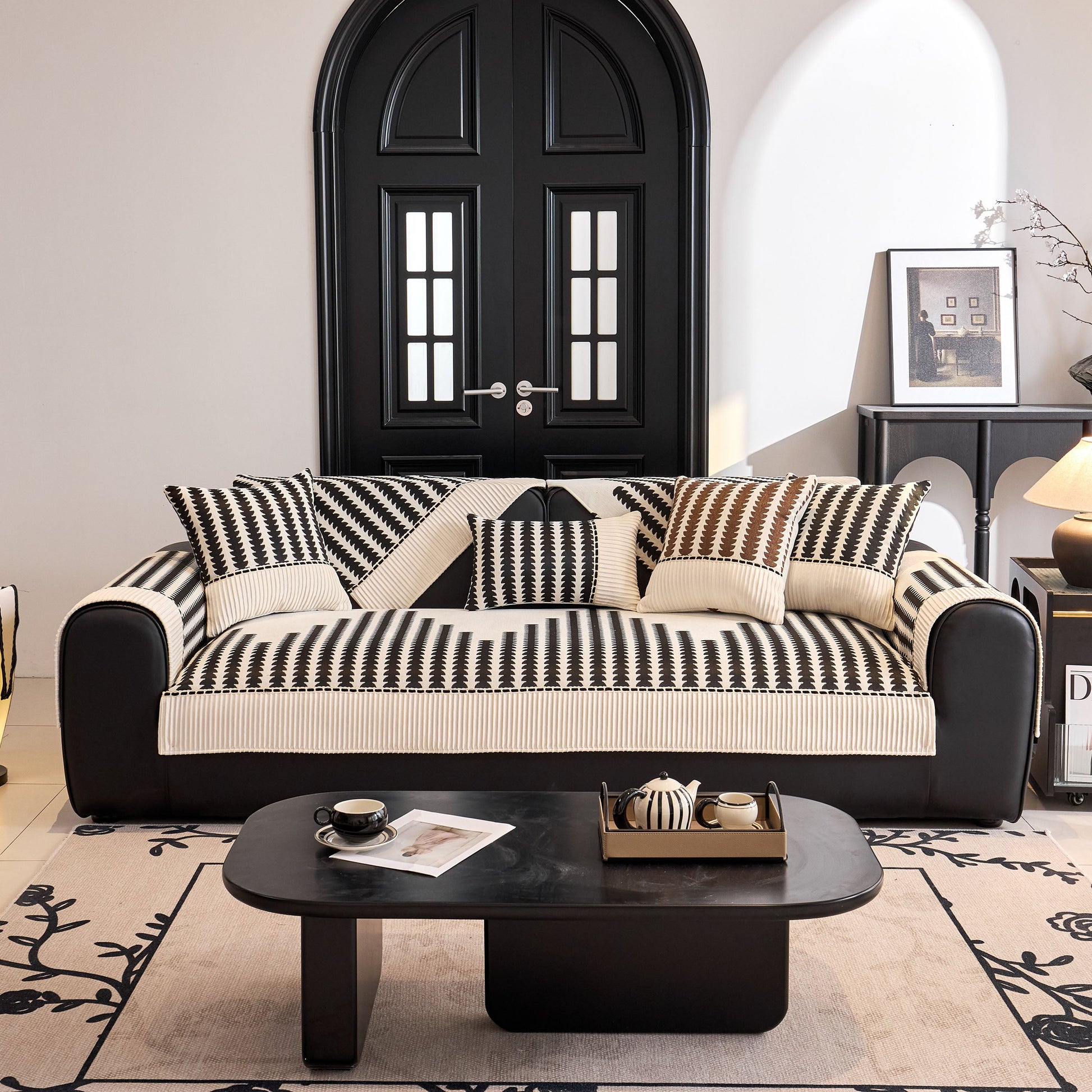 Living room with Vertical Stripes Sectional Sofa Cover Slipcover - Non-Slip, Fits L-Shape Couches in black and white design.