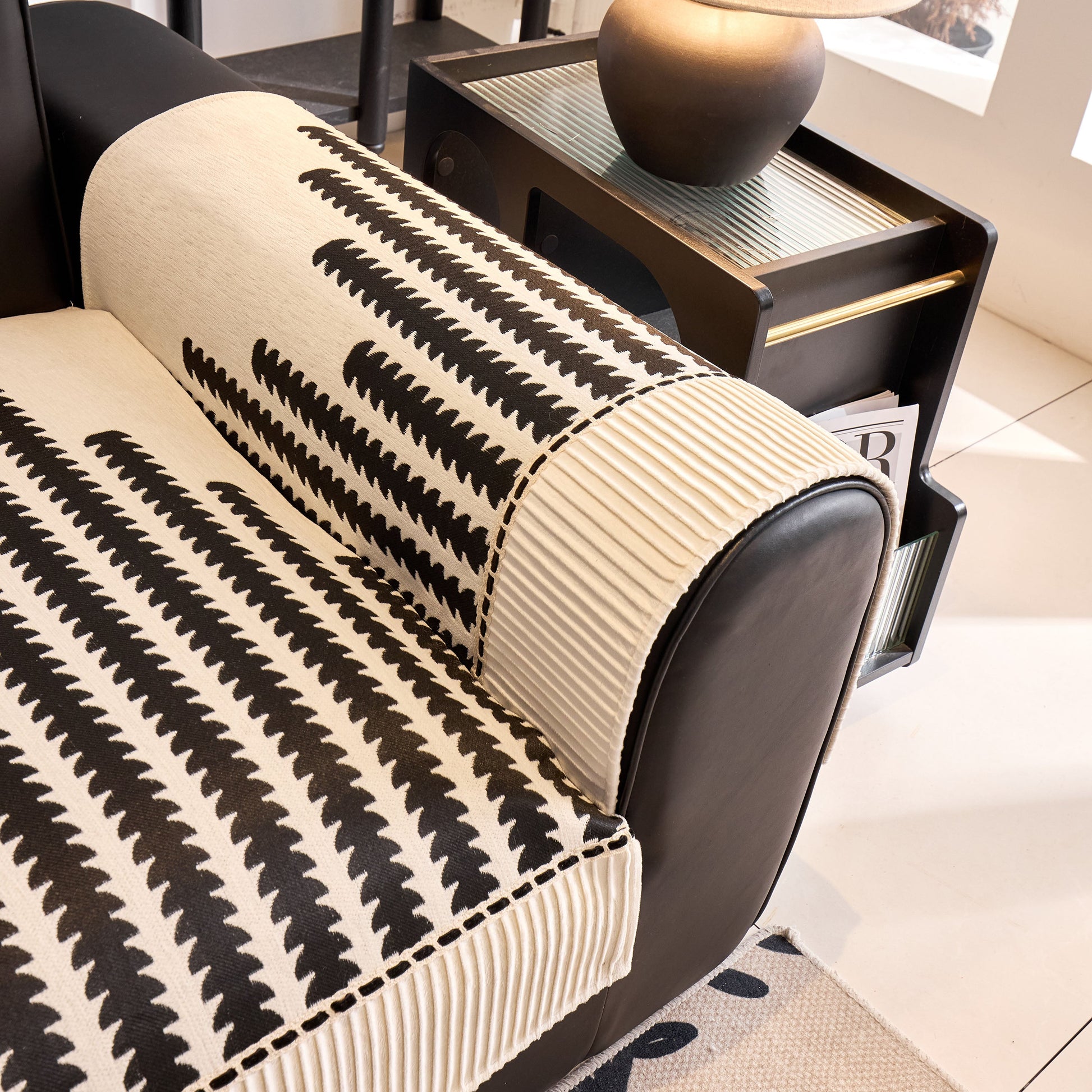 Vertical Stripes Sectional Sofa Cover Slipcover - Non-Slip, Fits L-Shape Couches with geometric pattern and black furniture.