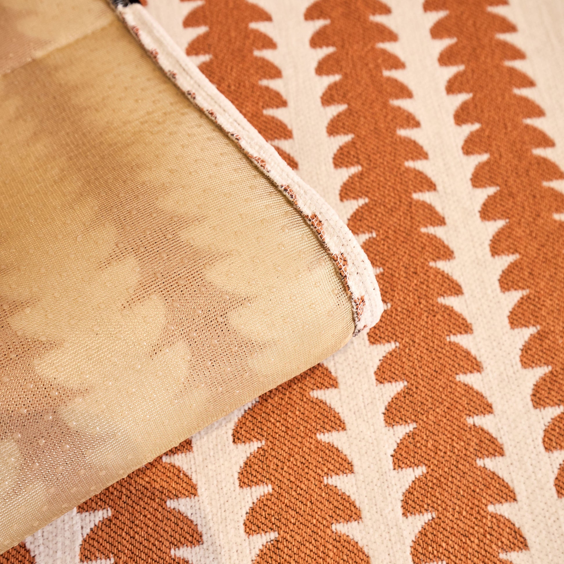 Close-up of Vertical Stripes Sectional Sofa Cover Slipcover with non-slip backing and geometric pattern in premium chenille fabric.