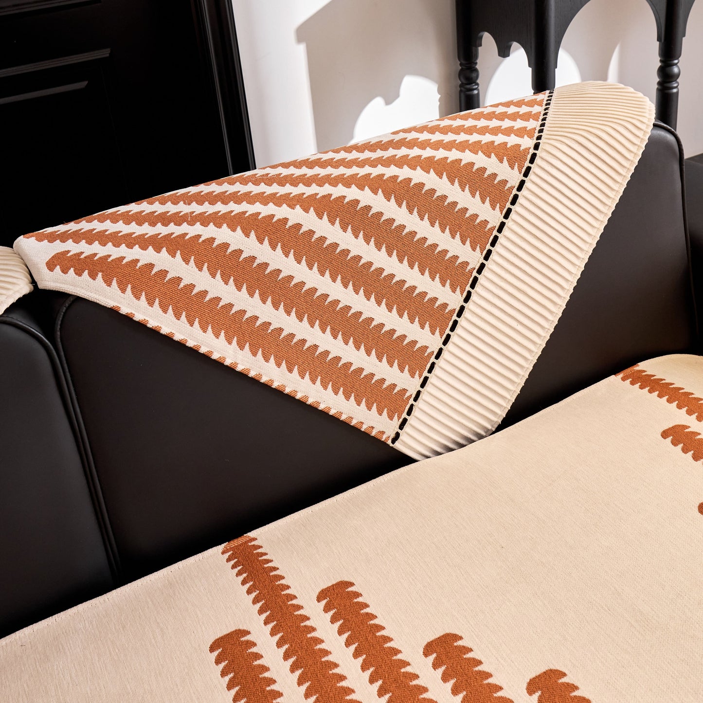 Vertical Stripes Sectional Sofa Cover Slipcover - Non-Slip, Fits L-Shape Couches in geometric pattern on black couch